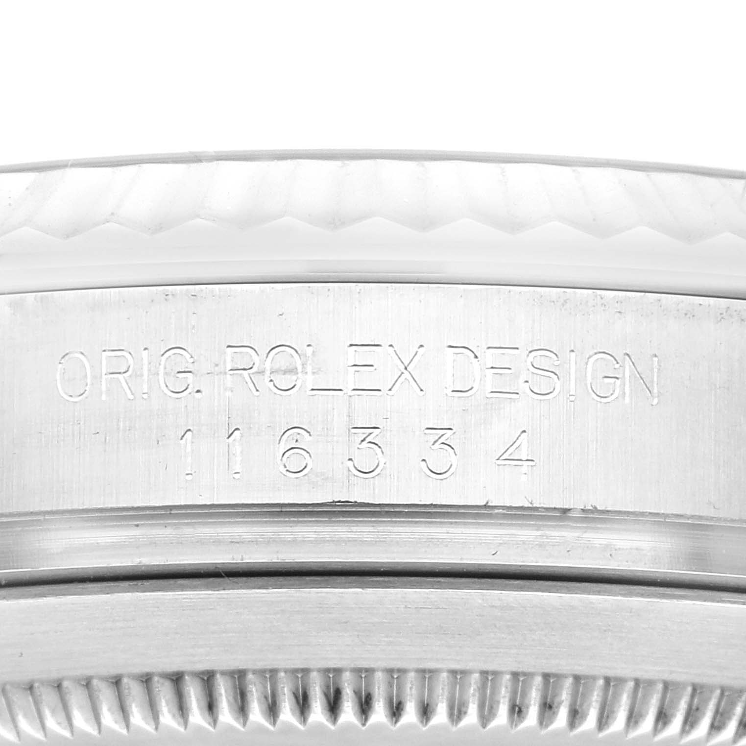 The image shows a close-up of the case side of a Rolex Datejust 41 116334 Men
s Stainless Steel Blue Dial 116334 Men
s Stainless Steel Blue Dial, displaying the "ORIG. ROLEX DESIGN" engraving and model number.