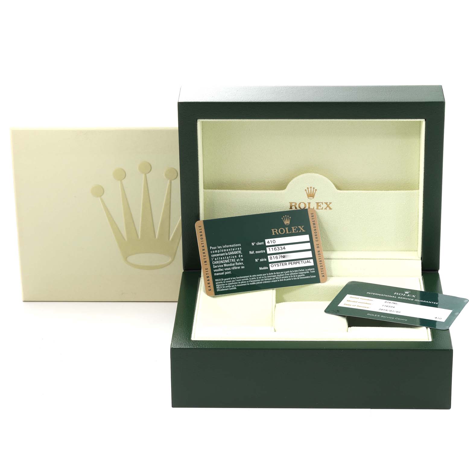 The image shows a Rolex Datejust 41 116334 Men
s Stainless Steel Blue Dial 116334 Men
s Stainless Steel Blue Dial watch box with two warranty cards placed in front.