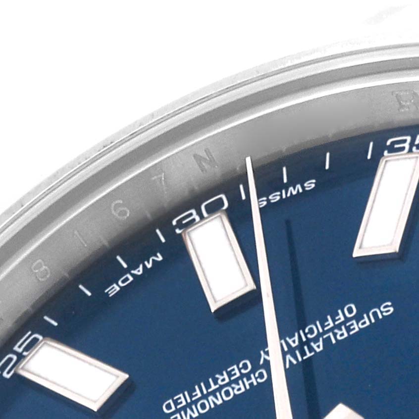 This is a close-up of the Rolex Datejust 41 116334 Men
s Stainless Steel Blue Dial 116334 Men
s Stainless Steel Blue Dial watch, showing the dial, minute markers, and a portion of the bezel.