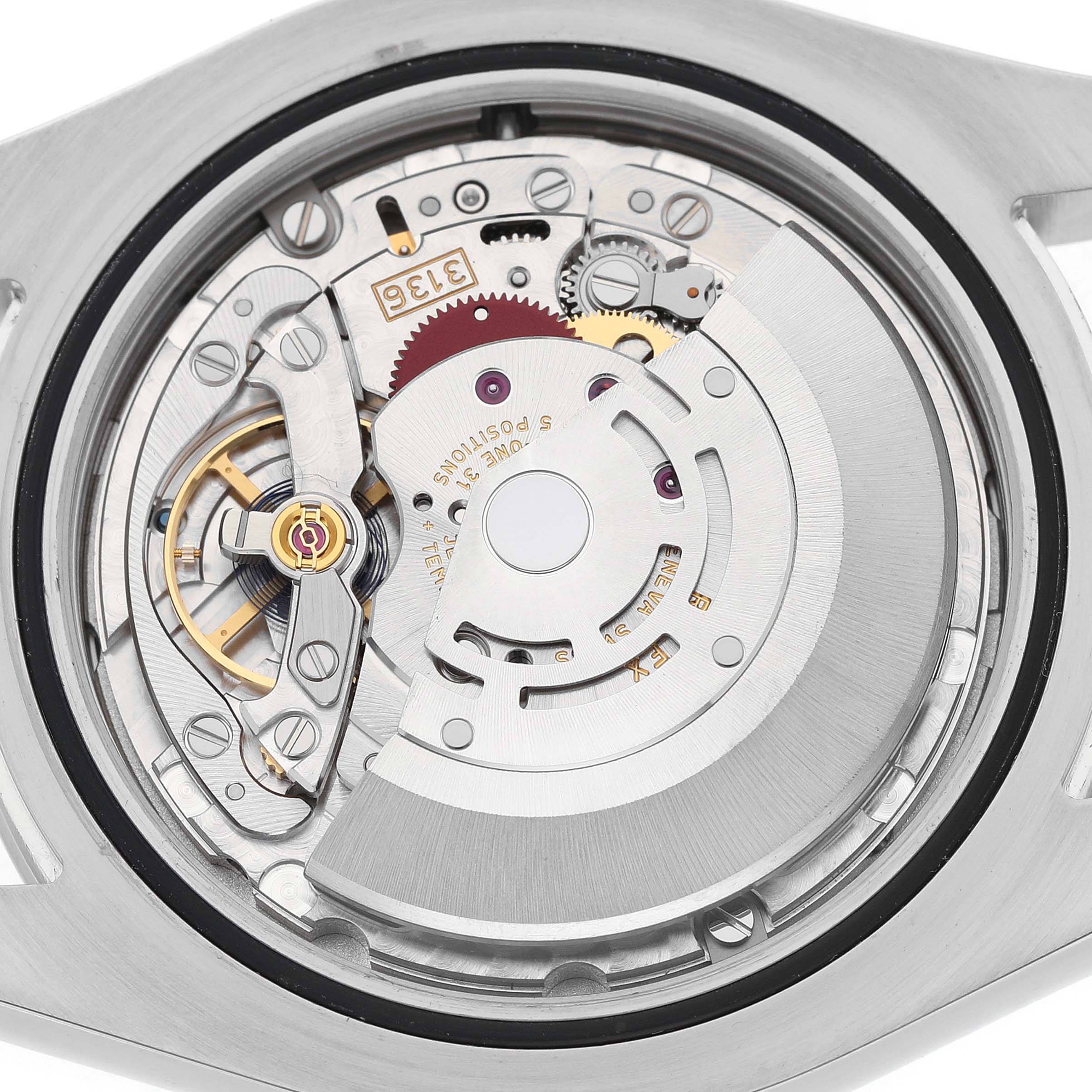 The image shows the movement mechanism of a Rolex Datejust 41 116300 Men's Stainless Steel Blue Dial, viewed from the back, highlighting gears and components.