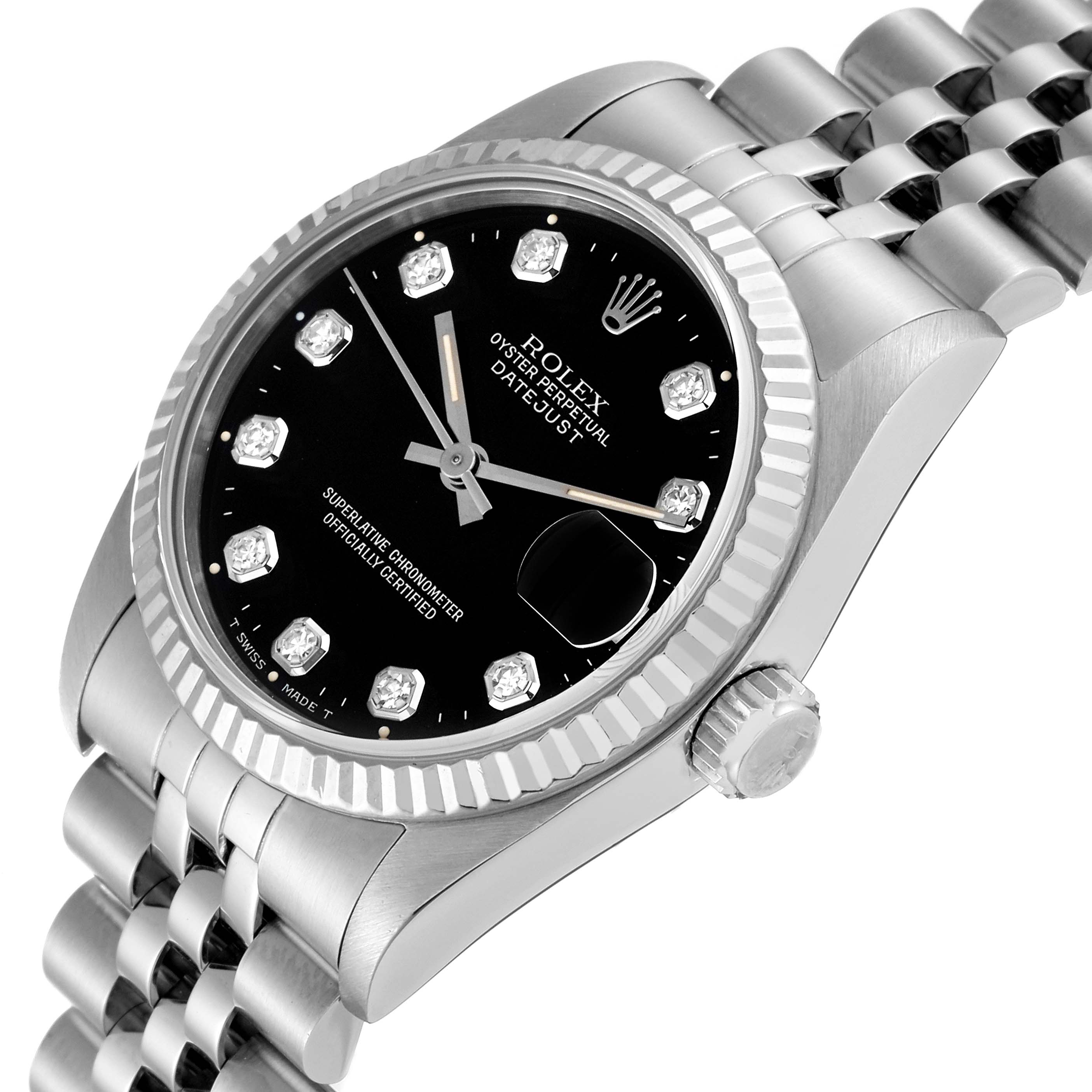 This image shows a close-up angle of a Rolex Mid-Size 68274 Women's Stainless Steel Black Dial 68274 Women's Stainless Steel Black Dial Oyster Perpetual Datejust, featuring its dial, bezel, and bracelet.