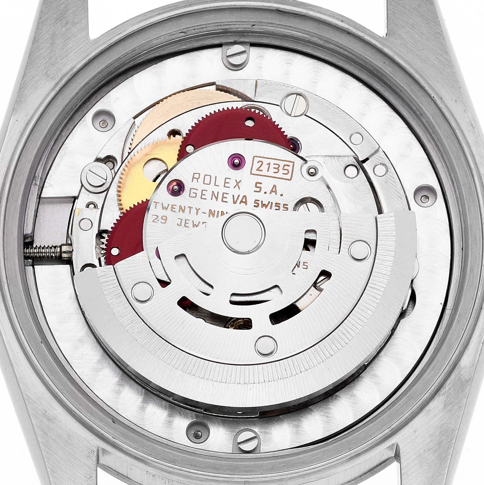 The image shows the internal mechanism of a Rolex Mid-Size 68274 Women's Stainless Steel Black Dial 68274 Women's Stainless Steel Black Dial model watch from a rear angle, highlighting the movement's components.