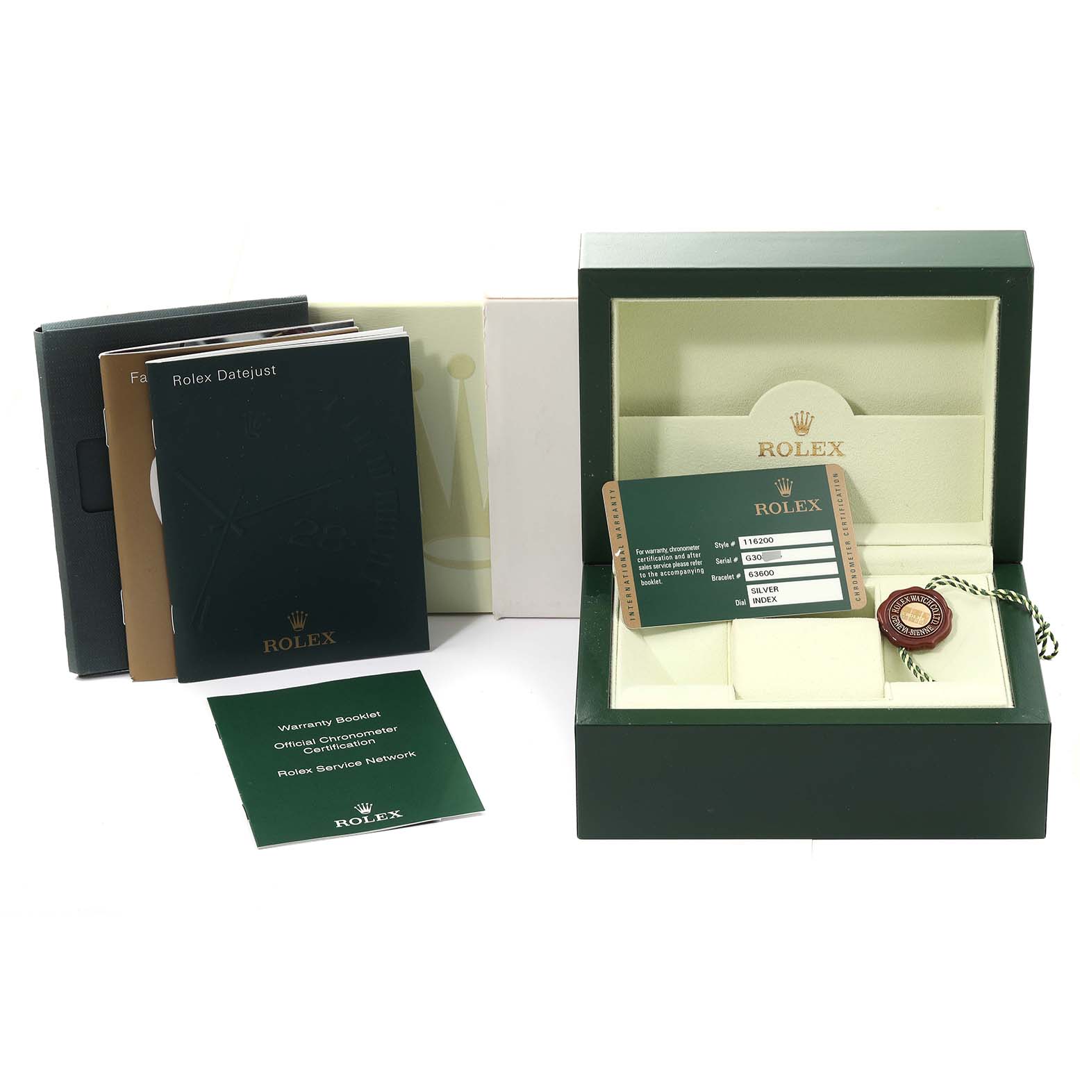 This image shows the accessories of a Rolex Datejust 116200 Men's Stainless Steel Silver Dial 116200 Men's Stainless Steel Silver Dial, including its box, warranty card, booklets, and tag, from an elevated angle.