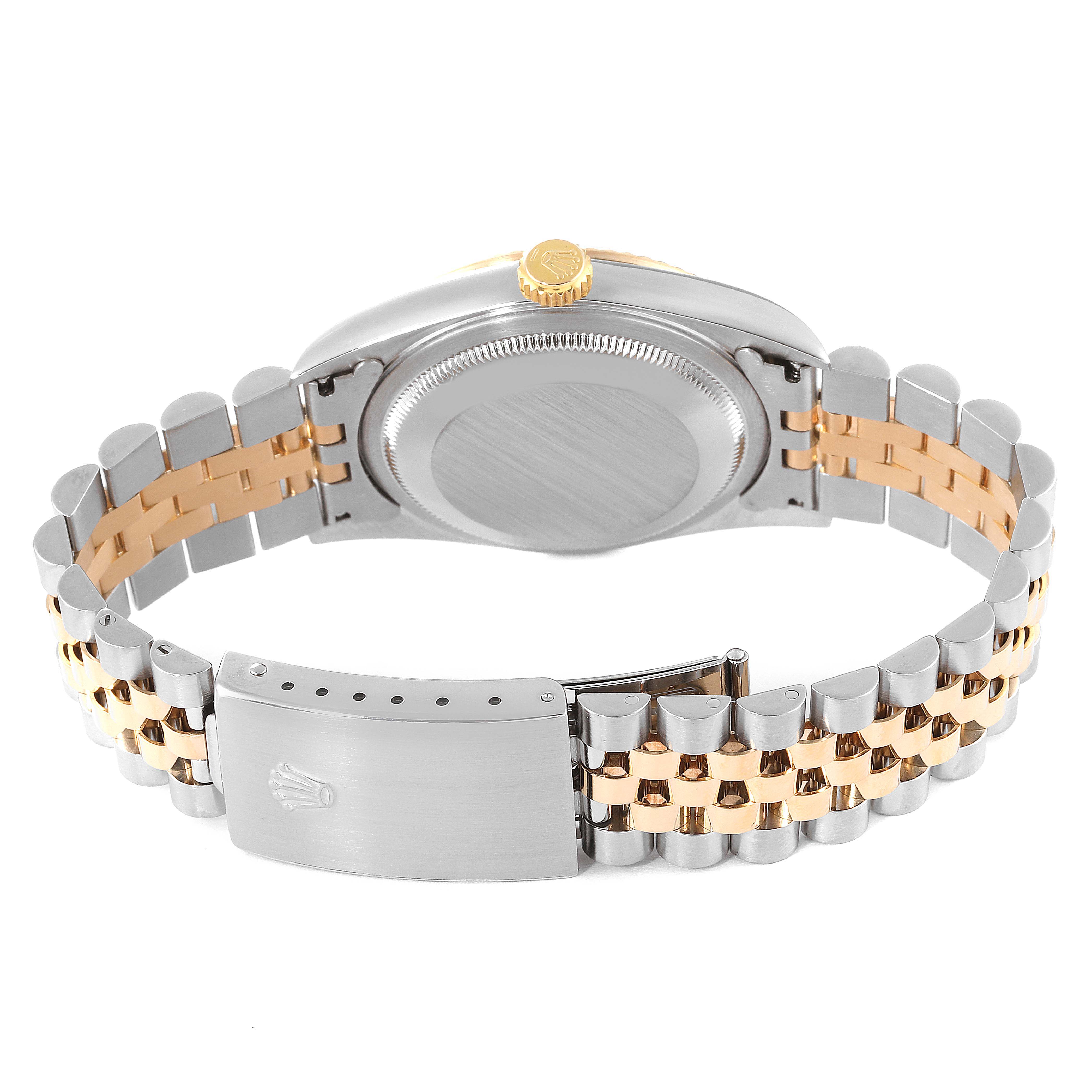 The image shows the back case and bracelet of a Rolex Datejust 16233 Men's Steel and Gold (two tone) Champagne Dial 16233 Men's Steel and Gold (two tone) Champagne Dial watch.