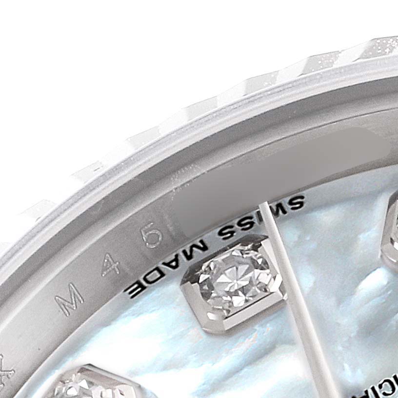 This partial close-up image shows the bezel, edge of the dial, and some index markers of a Rolex Datejust 179174 Women
s Stainless Steel Mother of Pearl Dial 179174 Women
s Stainless Steel Mother of Pearl Dial watch.