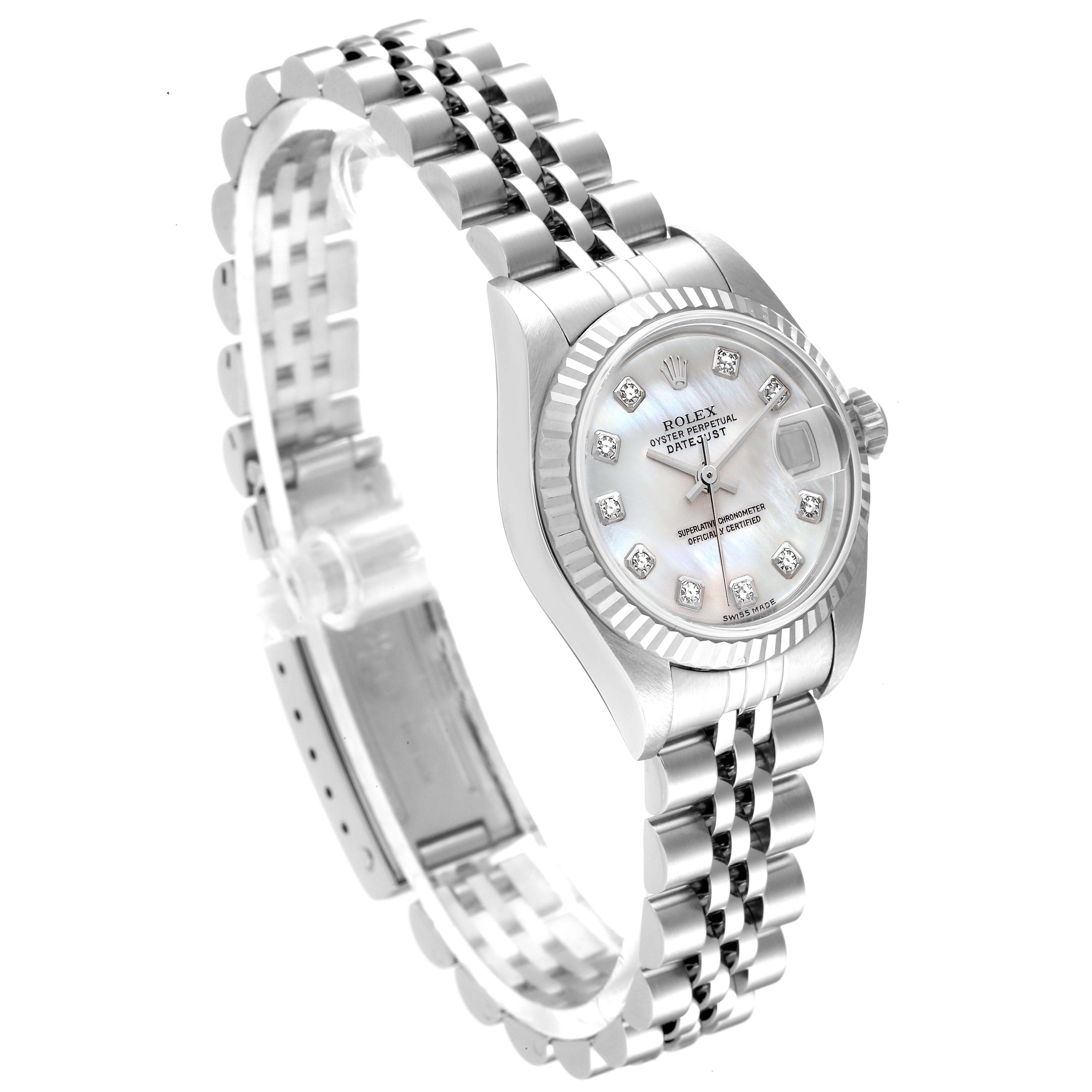 The Rolex Datejust 79174 Women
s Stainless Steel Mother of Pearl Dial 79174 Women
s Stainless Steel Mother of Pearl Dial watch is displayed at a slight angle, showcasing its face, bezel, and bracelet.
