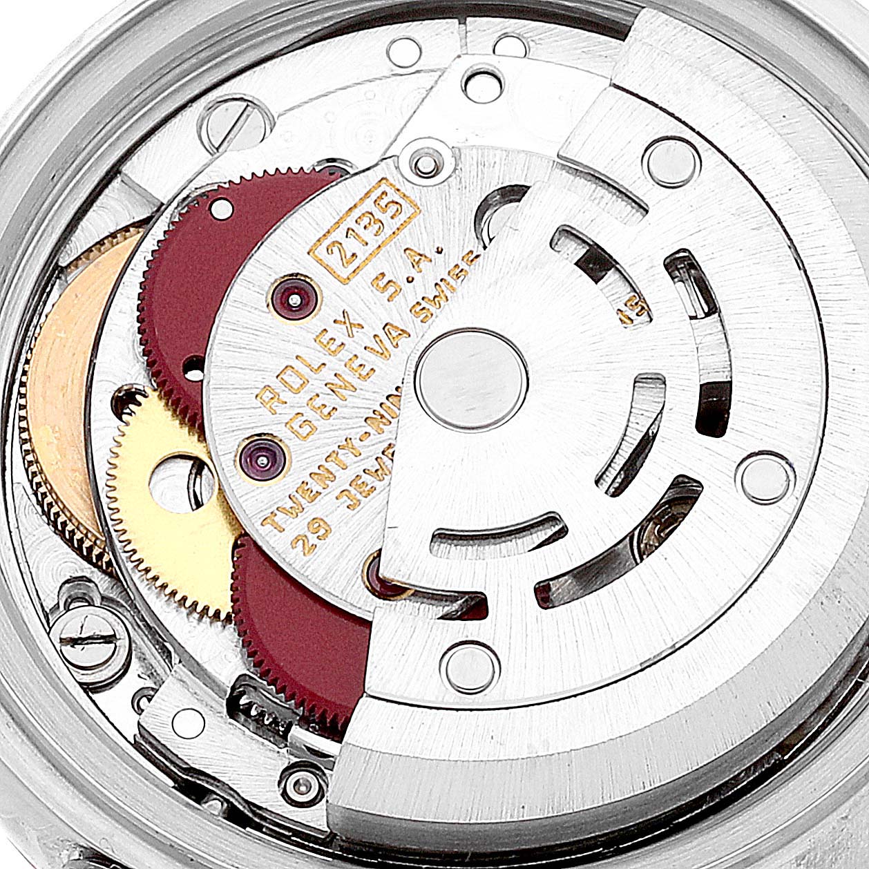 This is a close-up view of the inner mechanism of a Rolex Datejust 69173 Women's Steel and Gold (two tone) Champagne Dial 69173 Women's Steel and Gold (two tone) Champagne Dial watch, showing gears and the rotor.