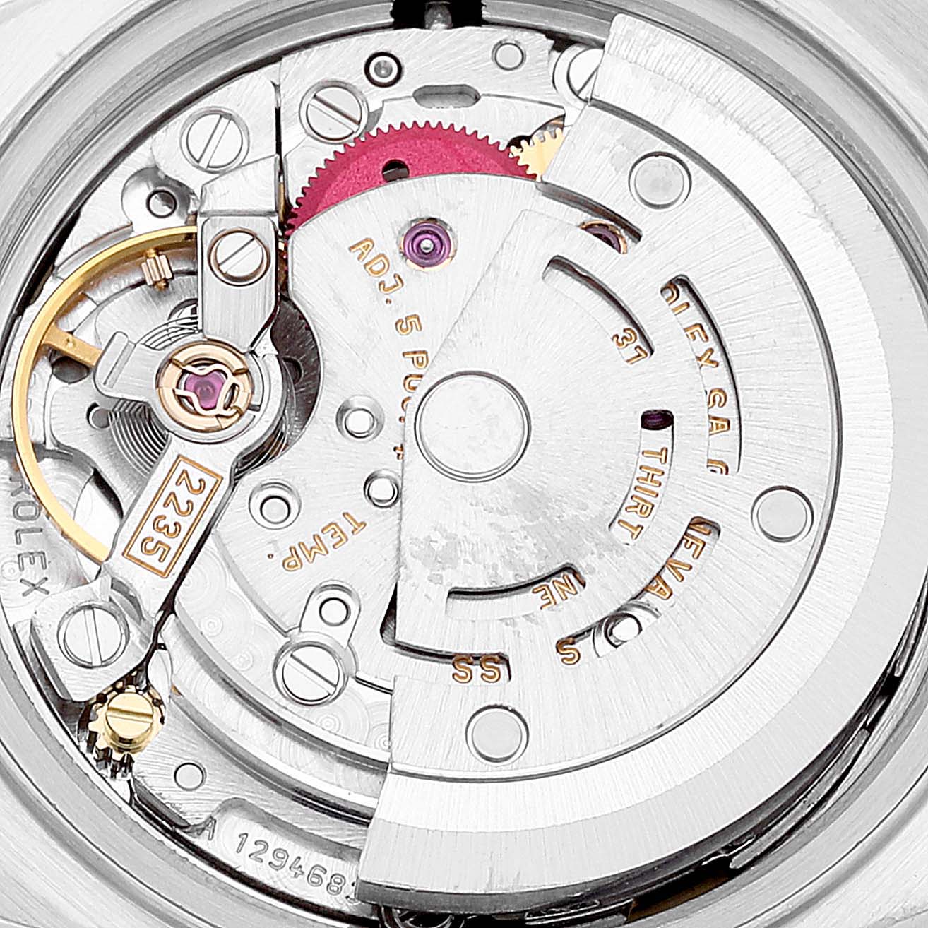 The image shows an intricate close-up of the movement mechanism inside a Rolex Datejust 79173 Women's Steel and Gold (two tone) Champagne Dial 79173 Women's Steel and Gold (two tone) Champagne Dial watch.