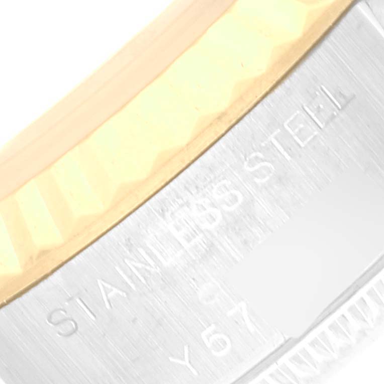 The image shows a close-up of the side of the case of a Rolex Datejust 79173 Women's Steel and Gold (two tone) Champagne Dial 79173 Women's Steel and Gold (two tone) Champagne Dial watch, highlighting the marking "STAINLESS STEEL."