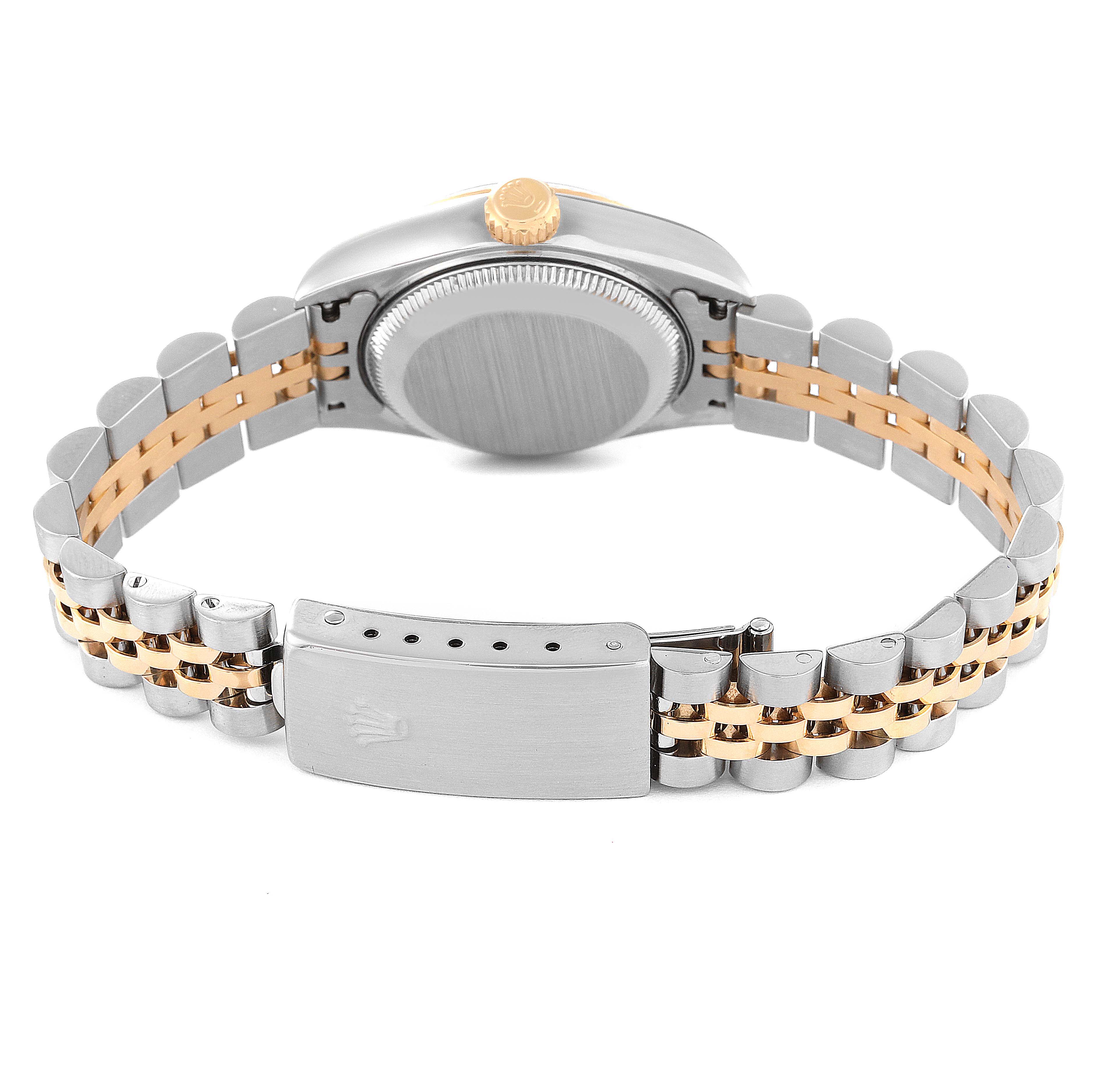 The image shows the back view of a Rolex Datejust 79173 Women's Steel and Gold (two tone) Champagne Dial 79173 Women's Steel and Gold (two tone) Champagne Dial watch, highlighting its bi-metal bracelet and clasp.
