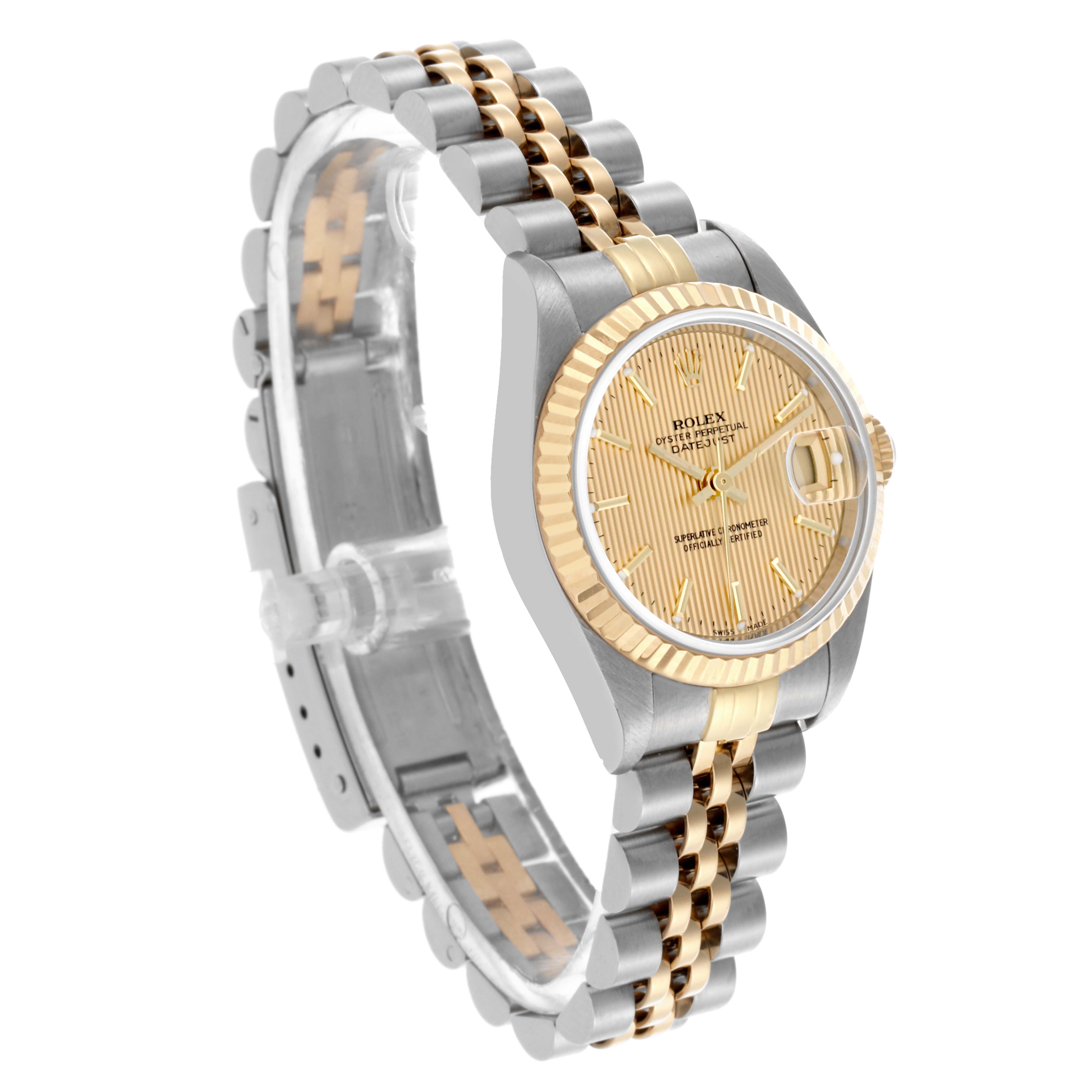 The Rolex Datejust 79173 Women's Steel and Gold (two tone) Champagne Dial 79173 Women's Steel and Gold (two tone) Champagne Dial watch is shown at a three-quarter angle, highlighting the dial, fluted bezel, and Jubilee bracelet.