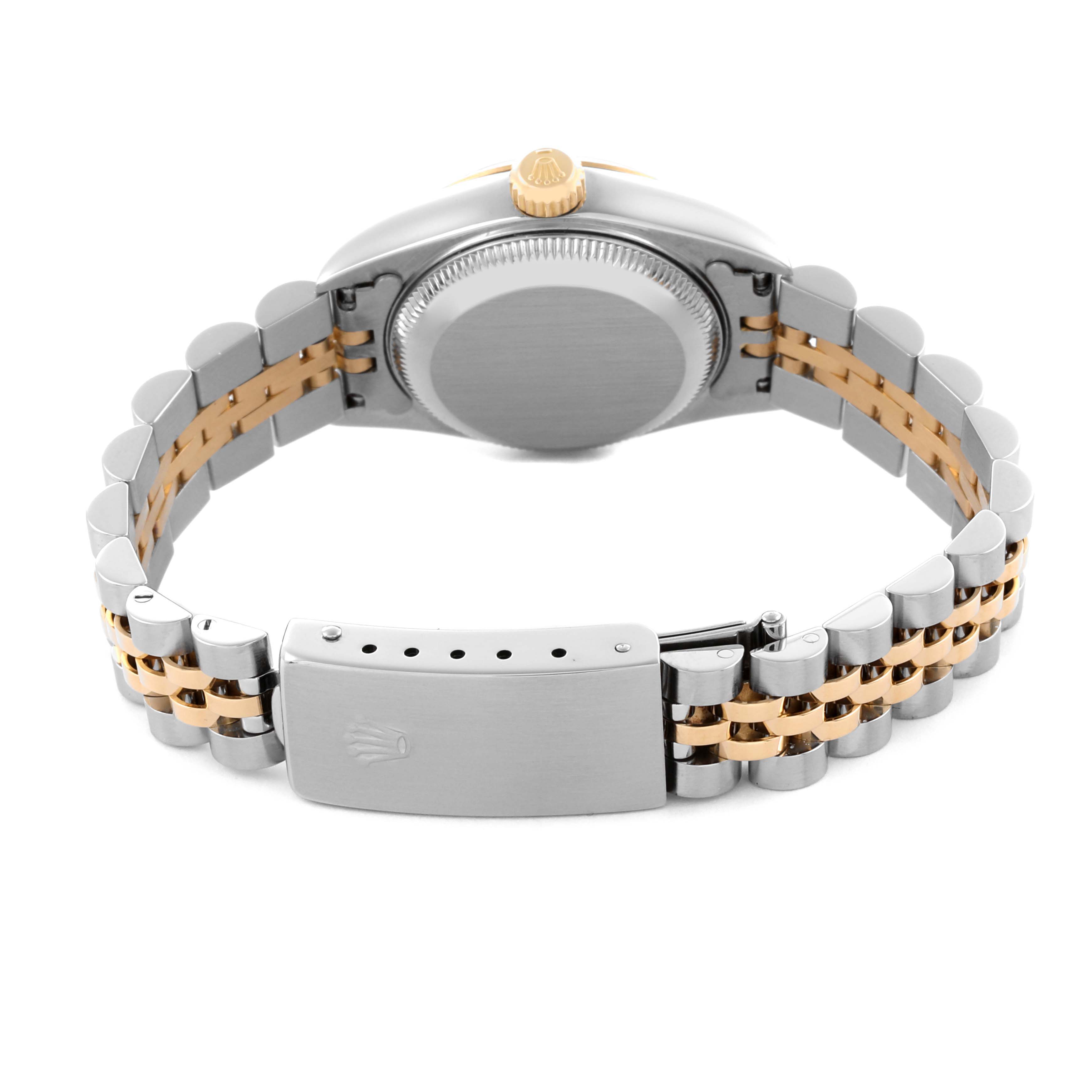 The Rolex Datejust 79173 Women's Steel and Gold (two tone) Champagne Dial 79173 Women's Steel and Gold (two tone) Champagne Dial watch is shown from the back, highlighting the clasp, bracelet, and case back.