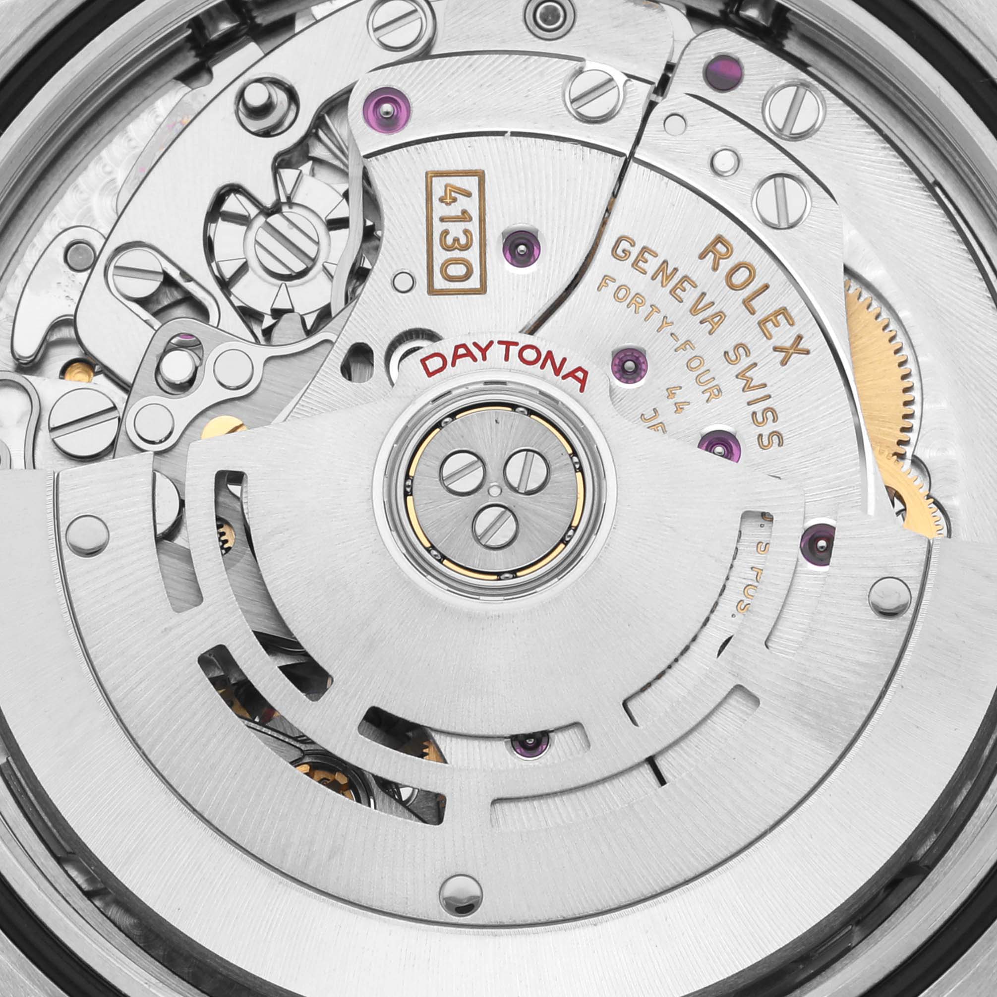 The image shows the movement mechanism of a Rolex Daytona 116503 Men's Steel and Gold (two tone) Mother of Pearl Dial 116503 Men's Steel and Gold (two tone) Mother of Pearl Dial watch, focusing on its intricate internal components.