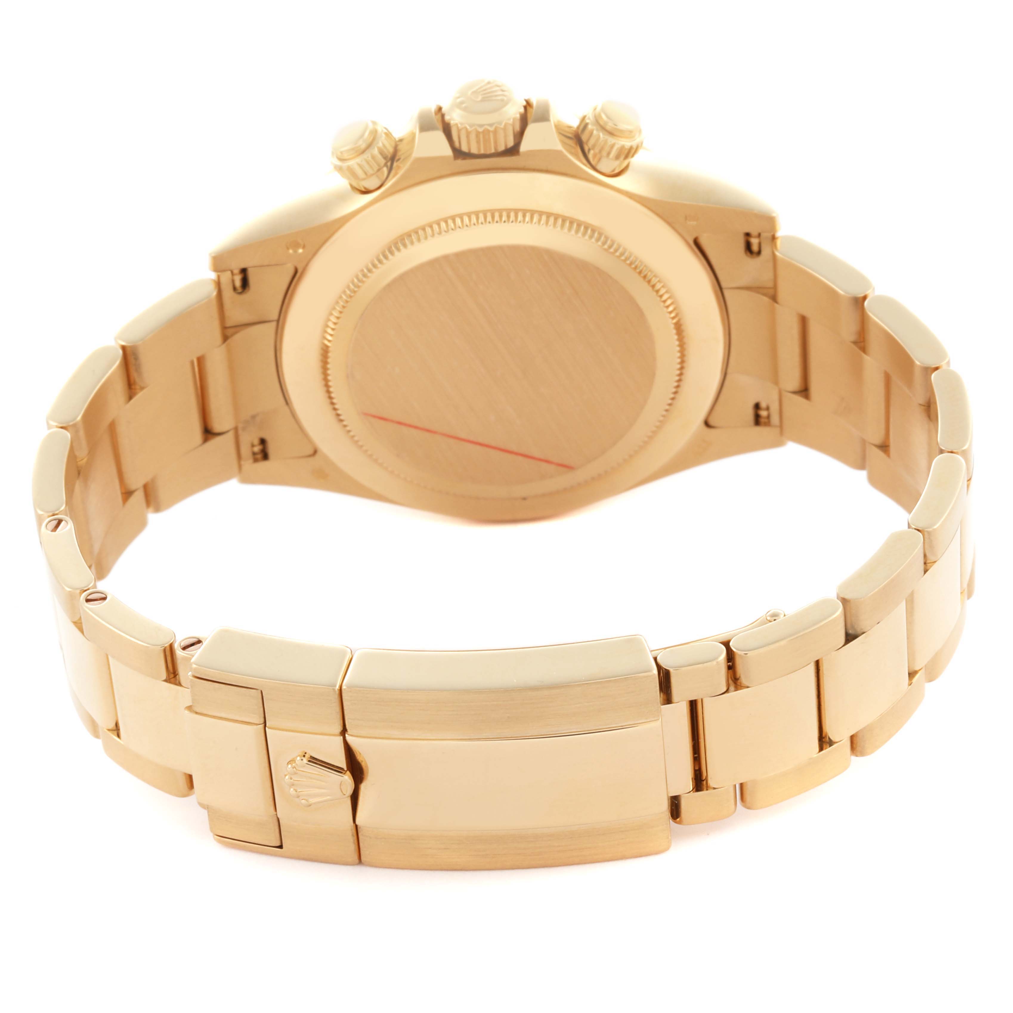 The image shows the back and clasp of a Rolex Daytona 116508 Men
s Yellow Gold Black Dial 116508 Men
s Yellow Gold Black Dial watch viewed from a rear angle.