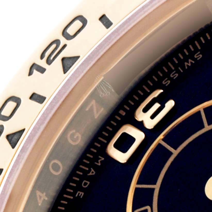 This close-up image shows part of the bezel and dial of the Rolex Daytona 116508 Men
s Yellow Gold Black Dial 116508 Men
s Yellow Gold Black Dial watch.