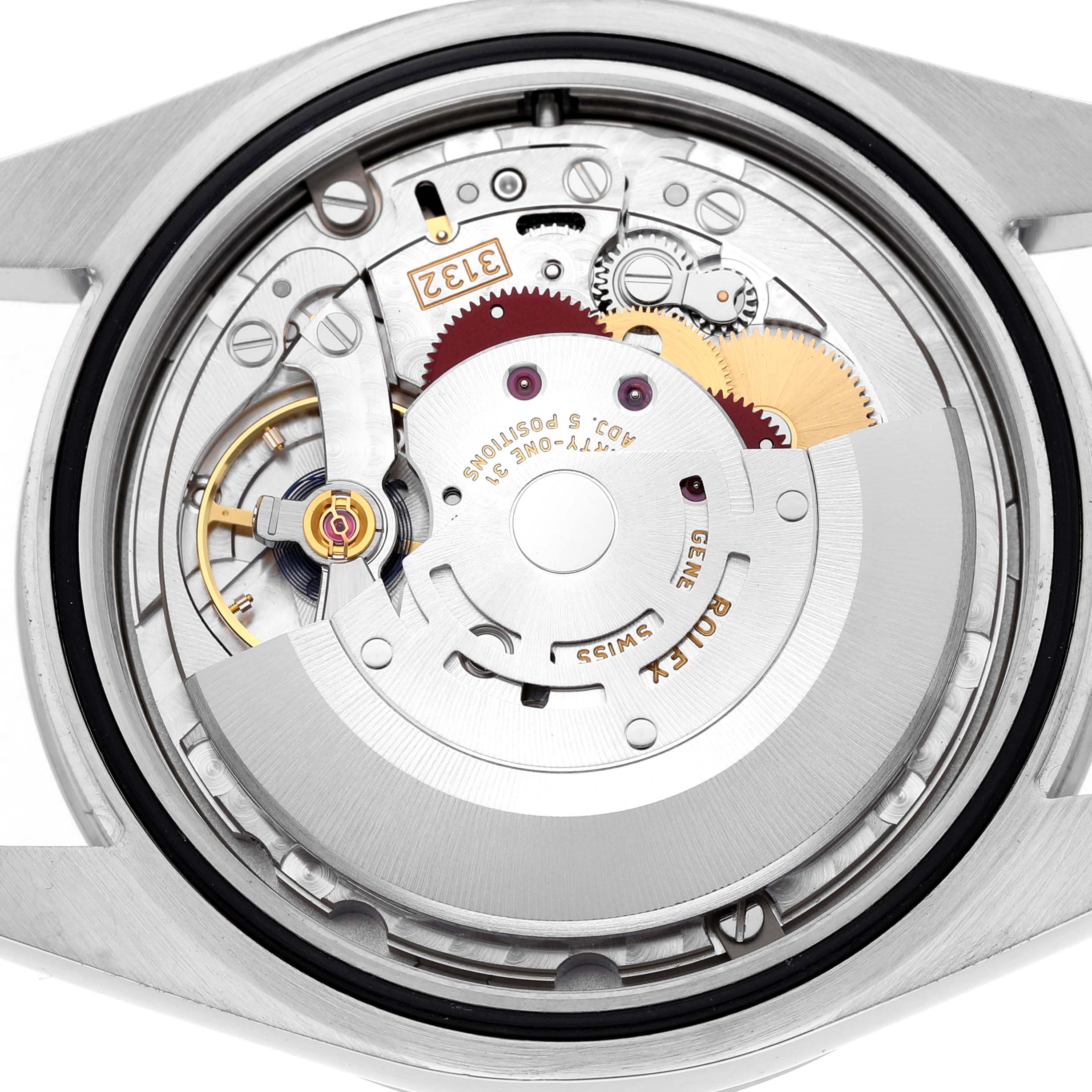 The image shows the movement of a Rolex Explorer 214270 Men's Stainless Steel Black Dial watch from a top-down angle, displaying gears and other intricate components.
