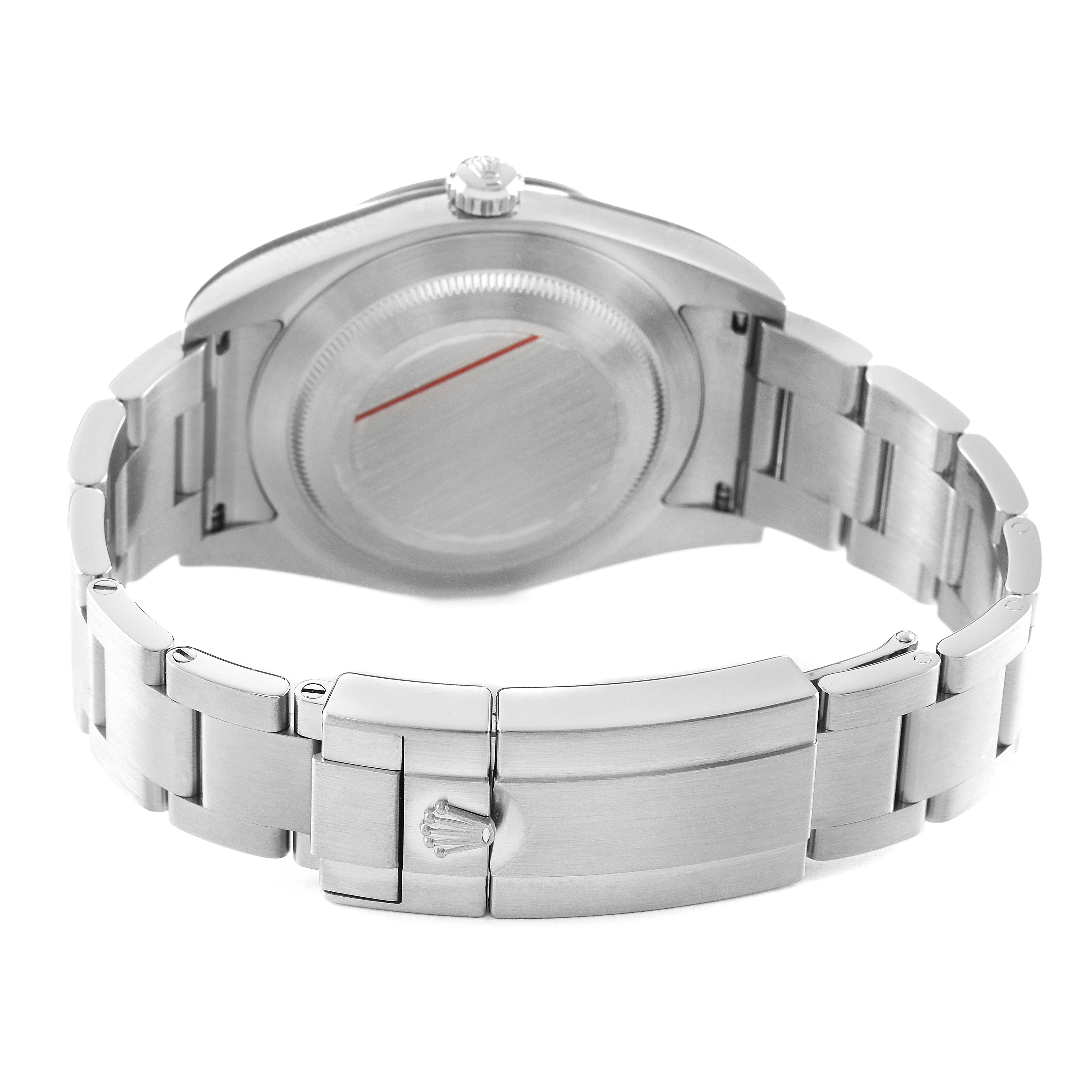 The Rolex Explorer 214270 Men's Stainless Steel Black Dial watch is shown from the rear, displaying the case back and stainless steel bracelet.