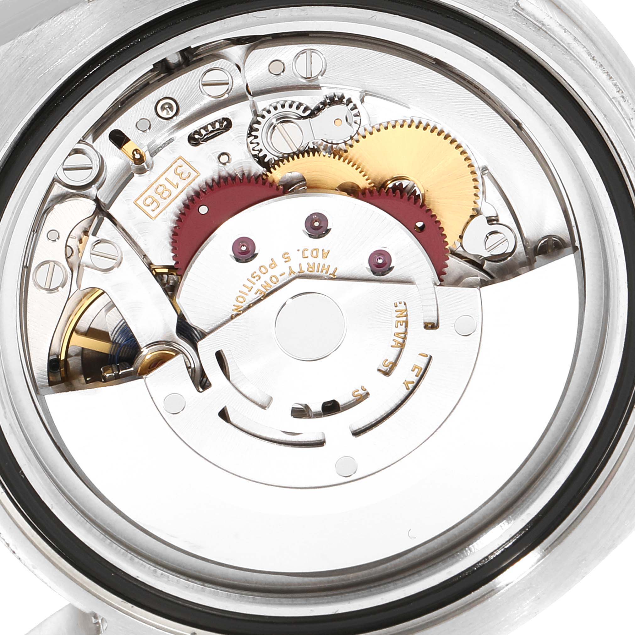 The image shows the internal movement components of a Rolex GMT-Master 116710 Men
s Stainless Steel Black Dial 116710 Men
s Stainless Steel Black Dial watch viewed from the back.