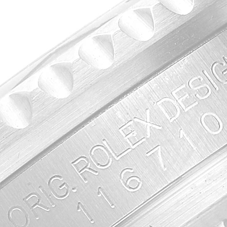 Close-up angle of the engraved case side of the Rolex GMT-Master 116710 Men
s Stainless Steel Black Dial 116710 Men
s Stainless Steel Black Dial, highlighting the model number and design details.