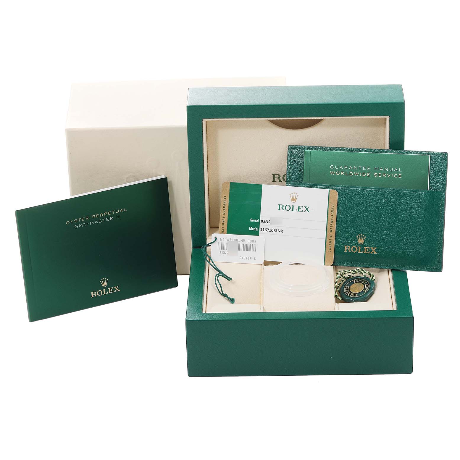 The image shows a Rolex GMT-Master 116710 Men
s Stainless Steel Black Dial 116710 Men
s Stainless Steel Black Dial watch box with guarantee manual, card holder, and tags.