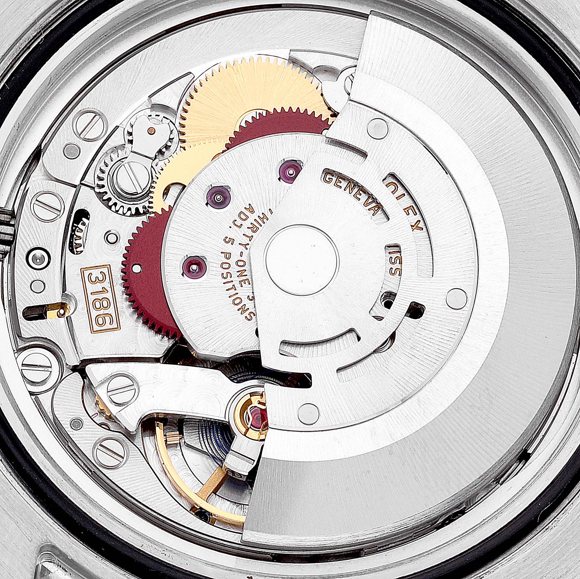 This image shows the detailed internal movement mechanism of a Rolex GMT-Master 116710 Men
s Stainless Steel Black Dial 116710 Men
s Stainless Steel Black Dial watch at a close-up angle.
