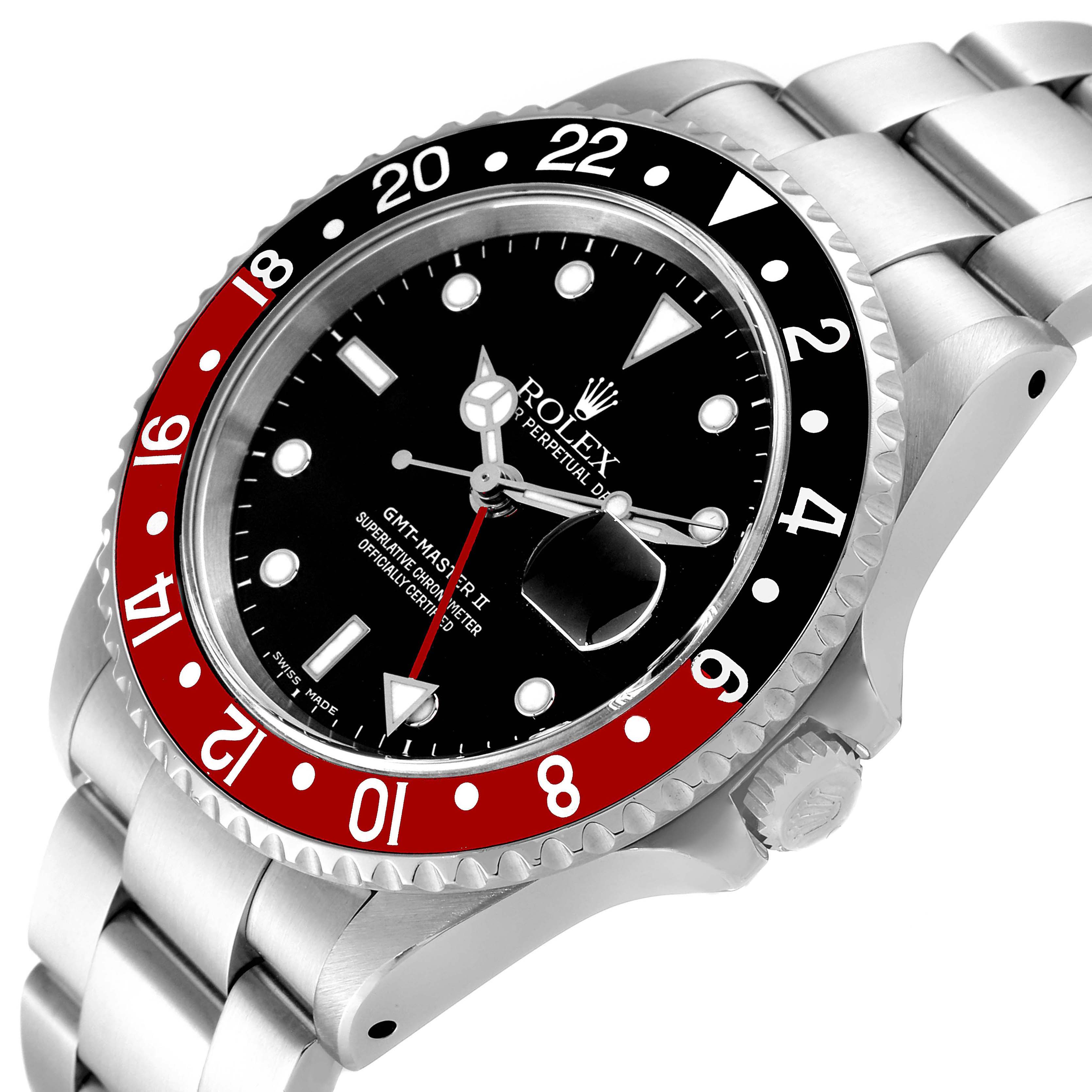 This image shows a tilted angle of the Rolex GMT-Master 16710 Men
s Stainless Steel Black Dial 16710 Men
s Stainless Steel Black Dial II watch, highlighting the bezel, dial, and bracelet.