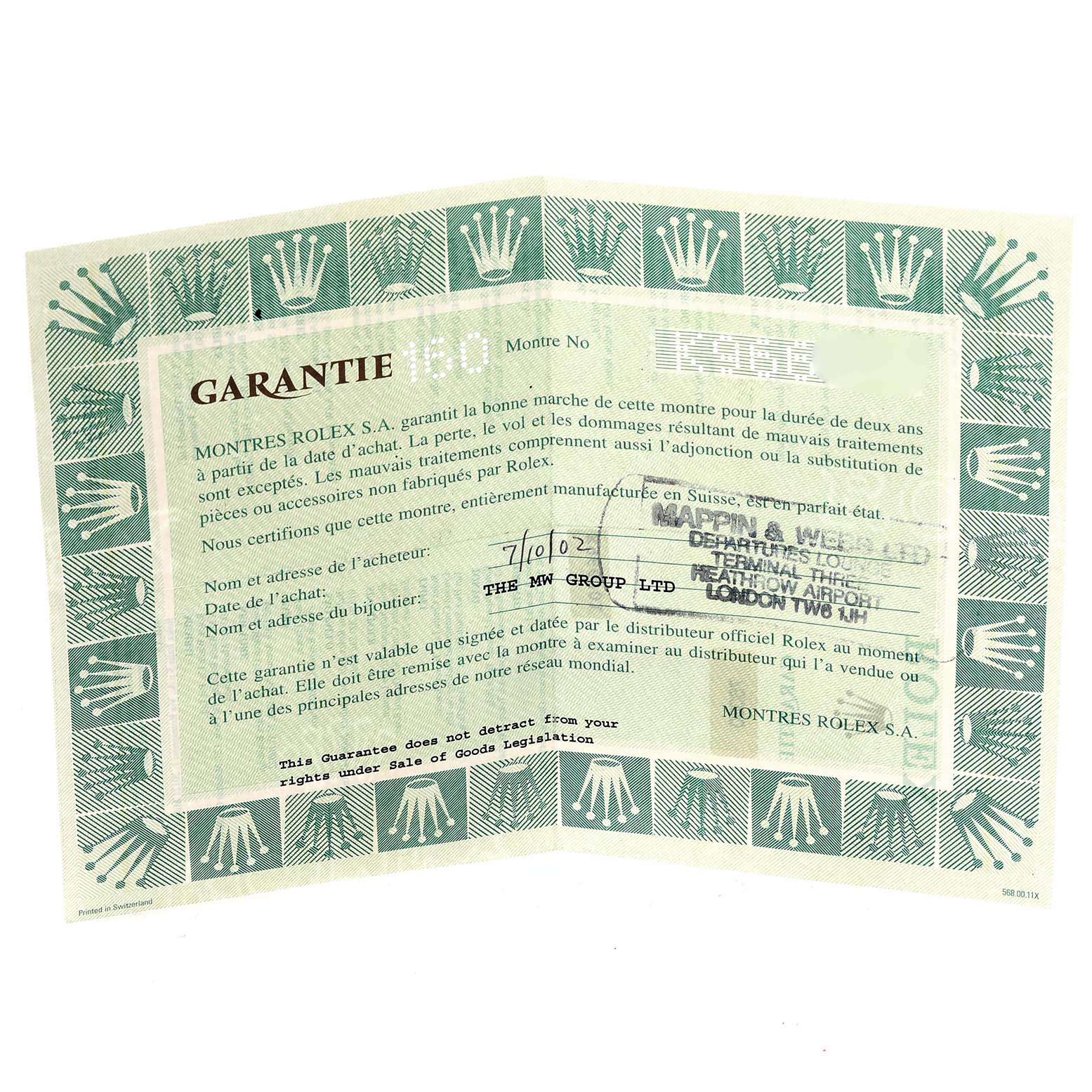 The image shows a warranty card for the Rolex Oyster Perpetual 76080 Women's Stainless Steel Orange Dial 76080 Women's Stainless Steel Orange Dial model, featuring a green design with text and a stamped date.