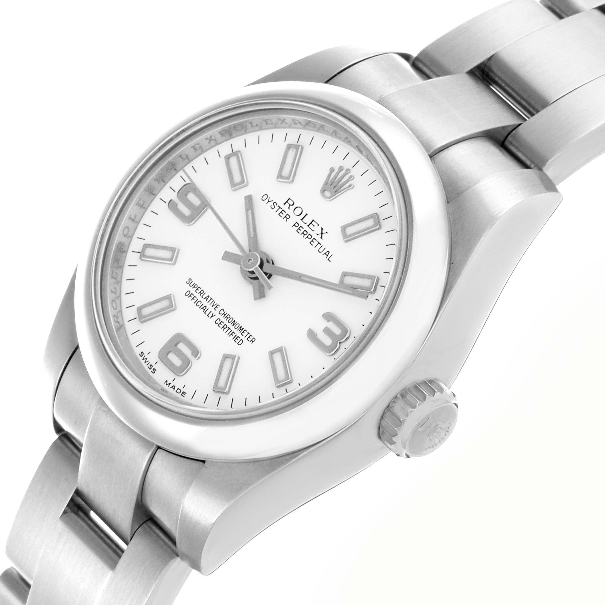 The Rolex Oyster Perpetual 176200 Women
s Stainless Steel White Dial 176200 Women
s Stainless Steel White Dial watch is shown from a three-quarter angle, highlighting the dial, bezel, crown, and bracelet.