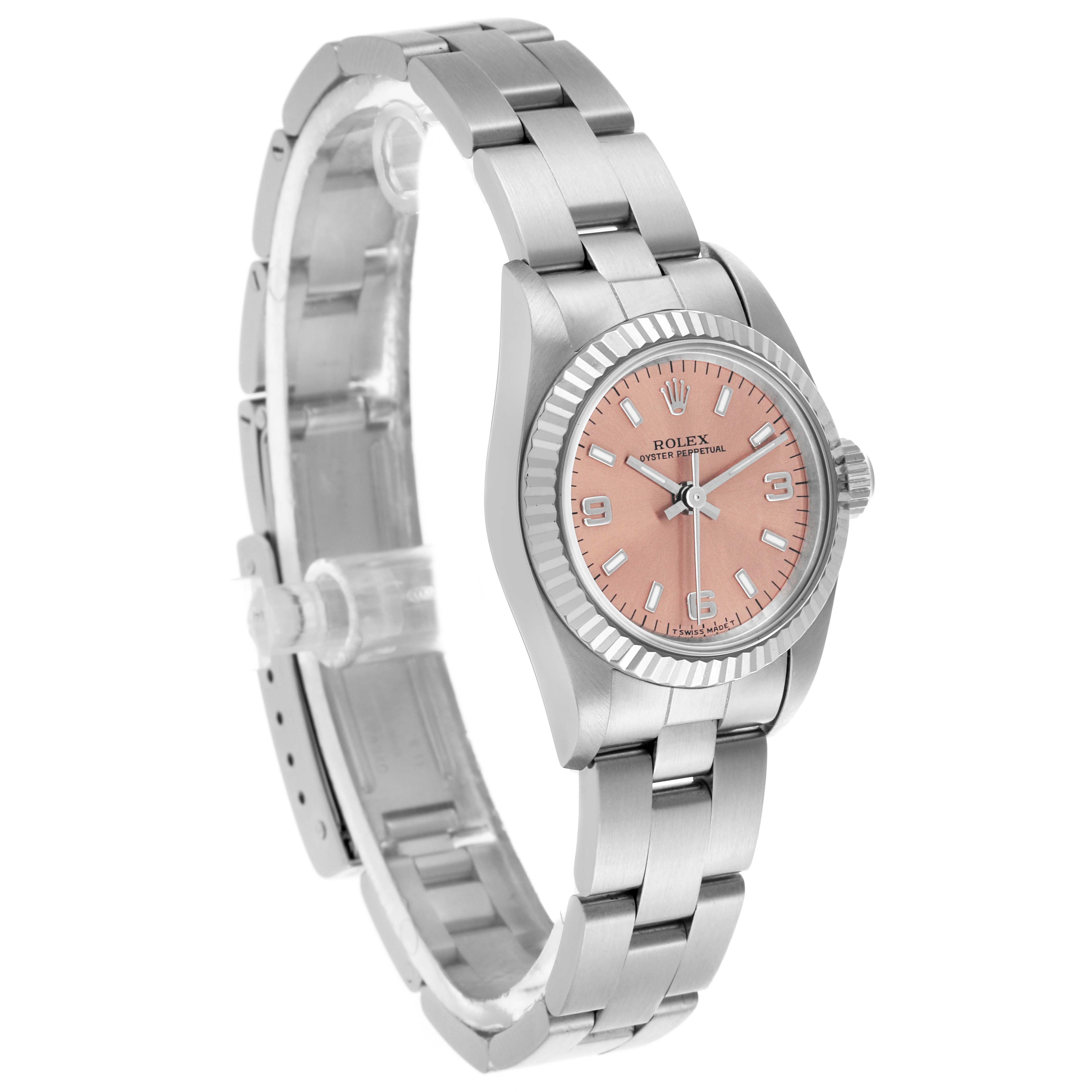 The Rolex Oyster Perpetual 67194 Women's Steel and Gold (two tone) Orange Dial 67194 Women's Steel and Gold (two tone) Orange Dial watch is shown at a three-quarter angle, highlighting the dial, bezel, and bracelet.