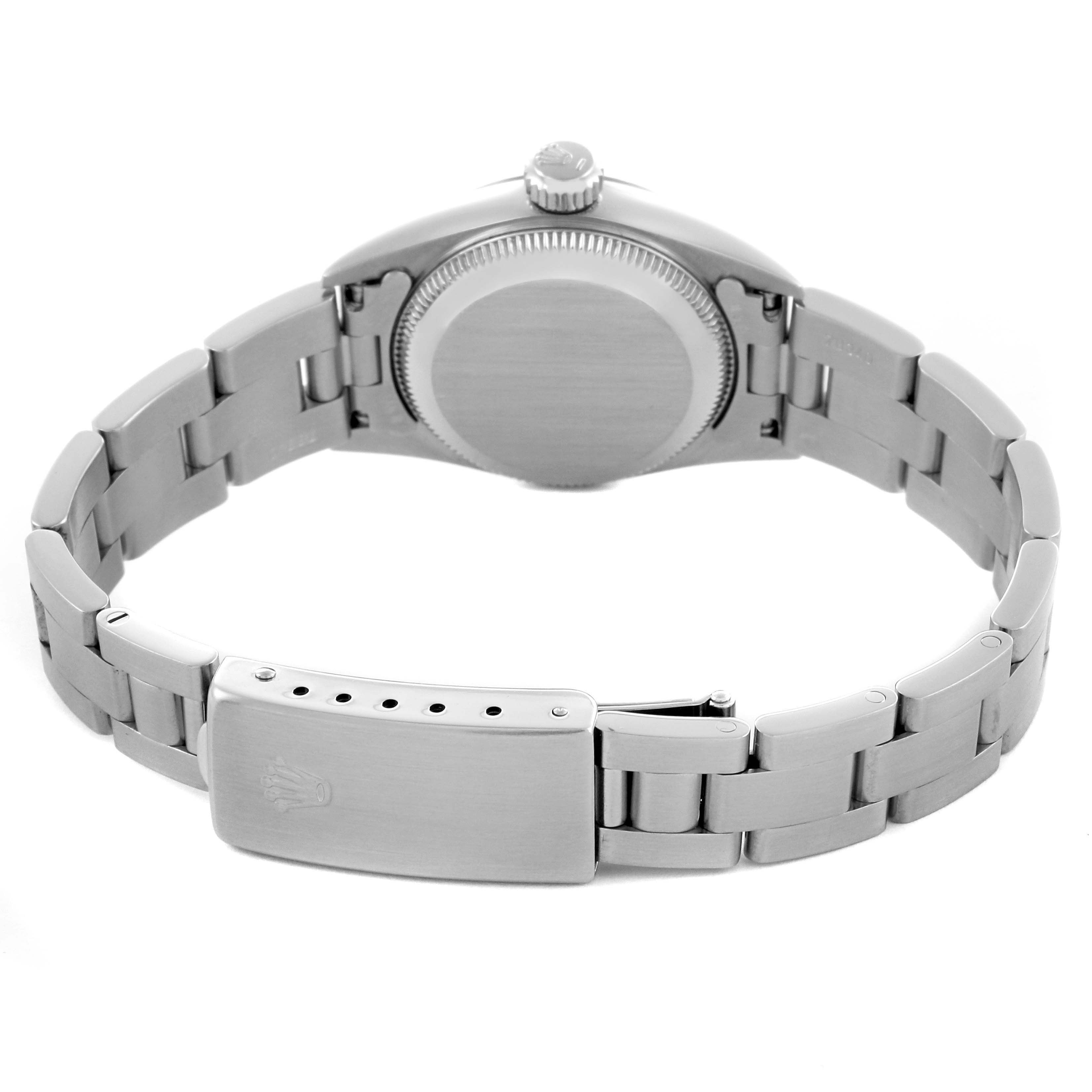 The image shows the back of the Rolex Oyster Perpetual 67194 Women's Steel and Gold (two tone) Orange Dial 67194 Women's Steel and Gold (two tone) Orange Dial, highlighting the bracelet and clasp from a rear angle.