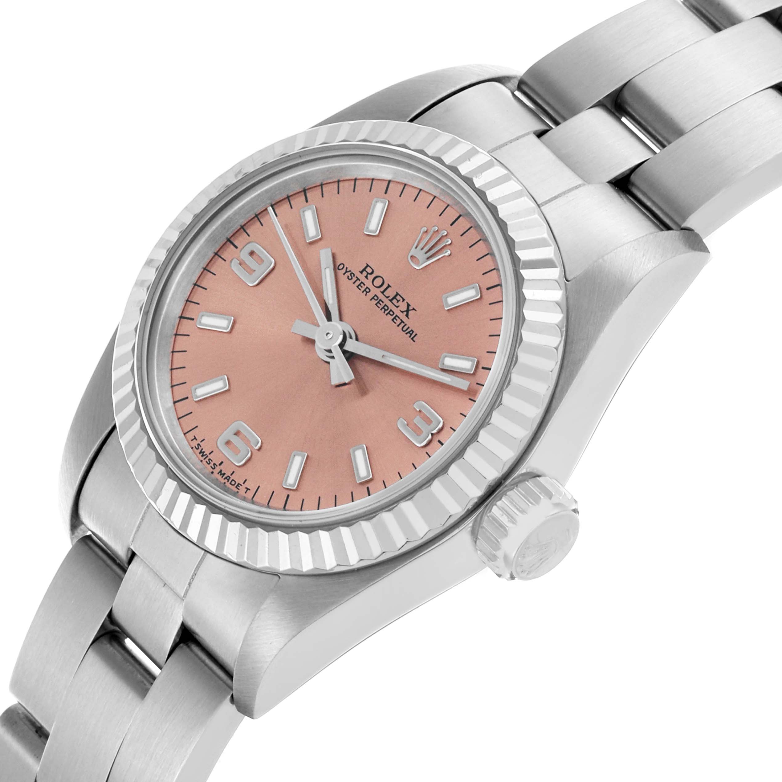 The Rolex Oyster Perpetual 67194 Women's Steel and Gold (two tone) Orange Dial 67194 Women's Steel and Gold (two tone) Orange Dial watch is shown at a three-quarter angle, highlighting the dial, bezel, and bracelet.