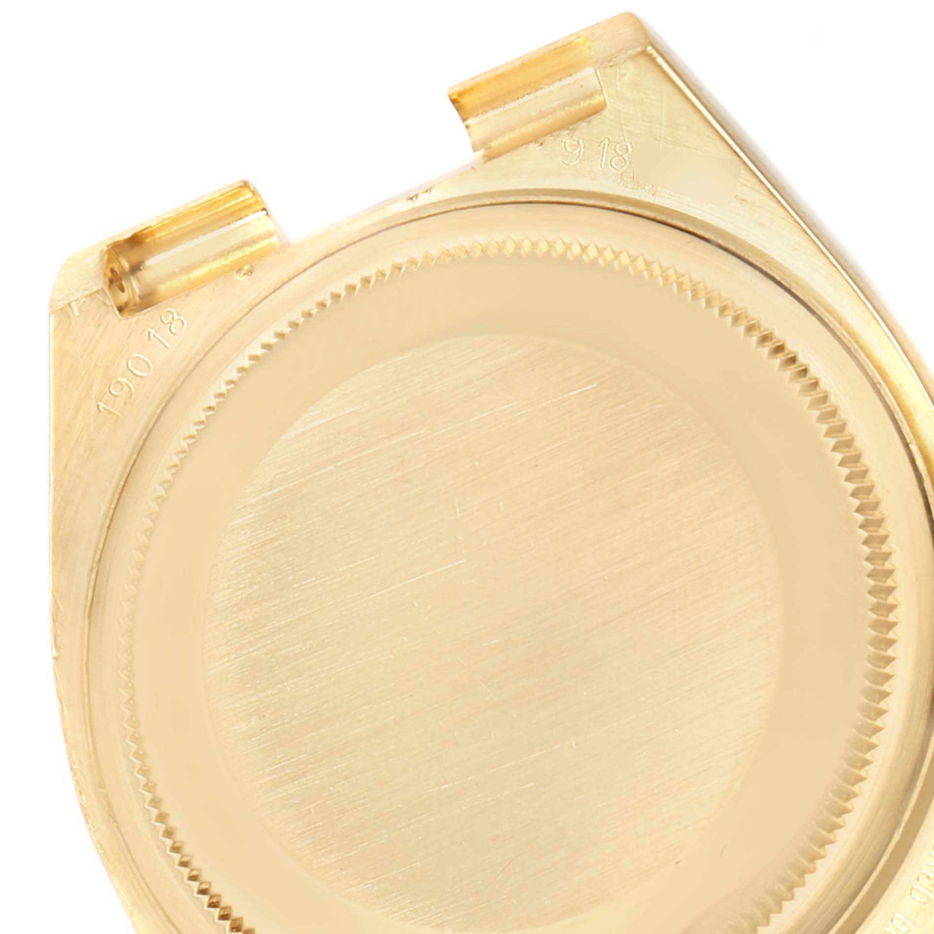 This close-up image shows the back case of the Rolex President 19018 Men's Yellow Gold Champagne Dial 19018 Men's Yellow Gold Champagne Dial model watch.