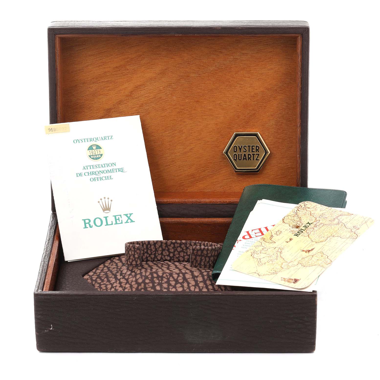 The image displays a Rolex President 19018 Men's Yellow Gold Champagne Dial 19018 Men's Yellow Gold Champagne Dial model watch box and accessories from a top-angle view, including booklets and certificates.