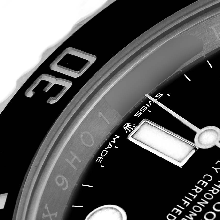 The image shows a close-up of the Rolex Submariner 126610 Men's Stainless Steel Black Dial's bezel and dial, highlighting the "30" marker and part of the watch hands.