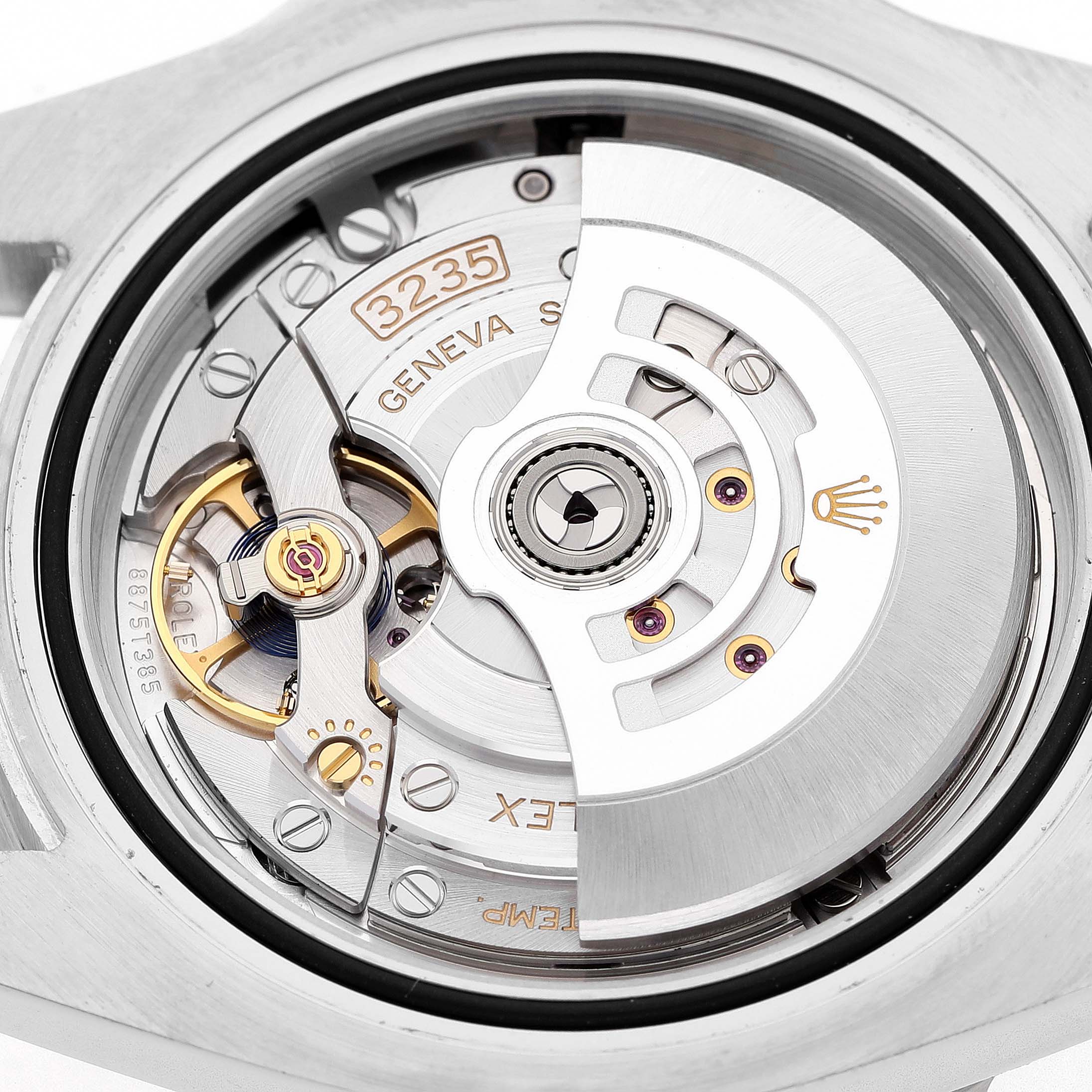 The image shows the movement of a Rolex Submariner 126610 Men's Stainless Steel Black Dial, focusing on the rotor and intricate inner mechanics.