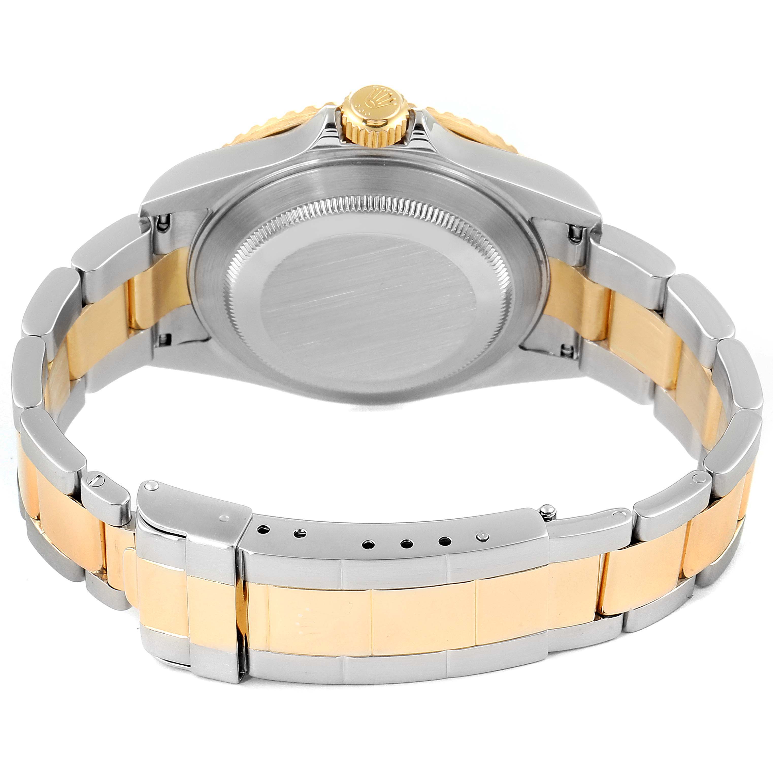 The image shows the back view and bracelet of a Rolex Submariner 16613 Men's Steel and Gold (two tone) Blue Dial 16613 Men's Steel and Gold (two tone) Blue Dial, highlighting its two-tone metal design and crown.