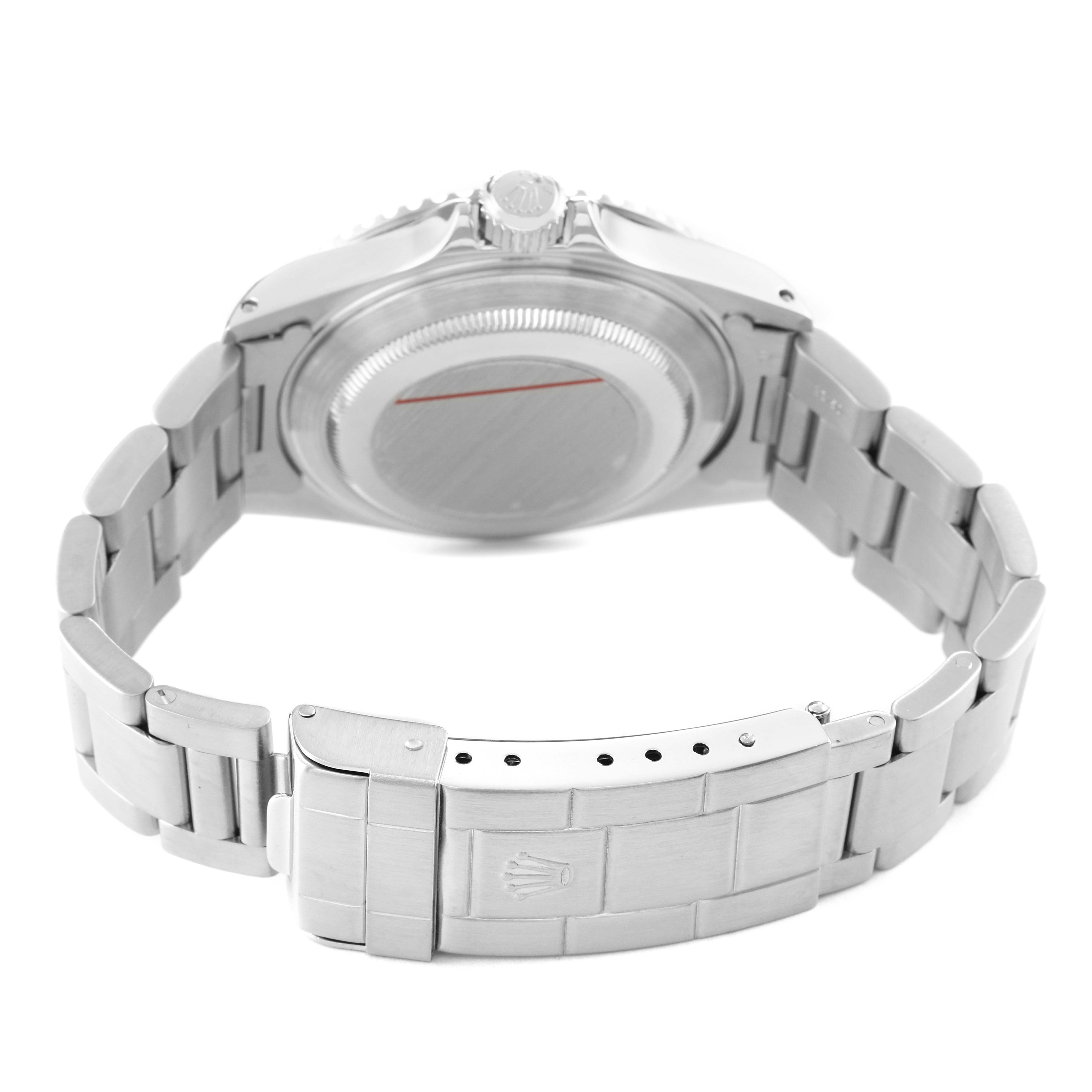 The image shows the back and bracelet clasp of a Rolex Submariner 14060 Men's Stainless Steel Black Dial, viewed from a slightly elevated angle.