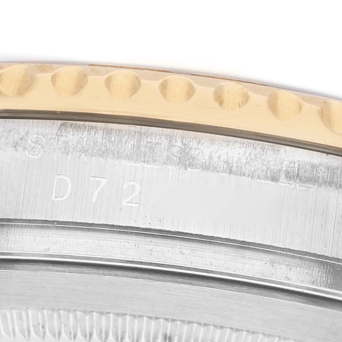 The image shows a close-up of the bezel and case back of a Rolex Yacht-Master 16623 Men's Steel and Gold (two tone) White Dial watch, highlighting engraved details.