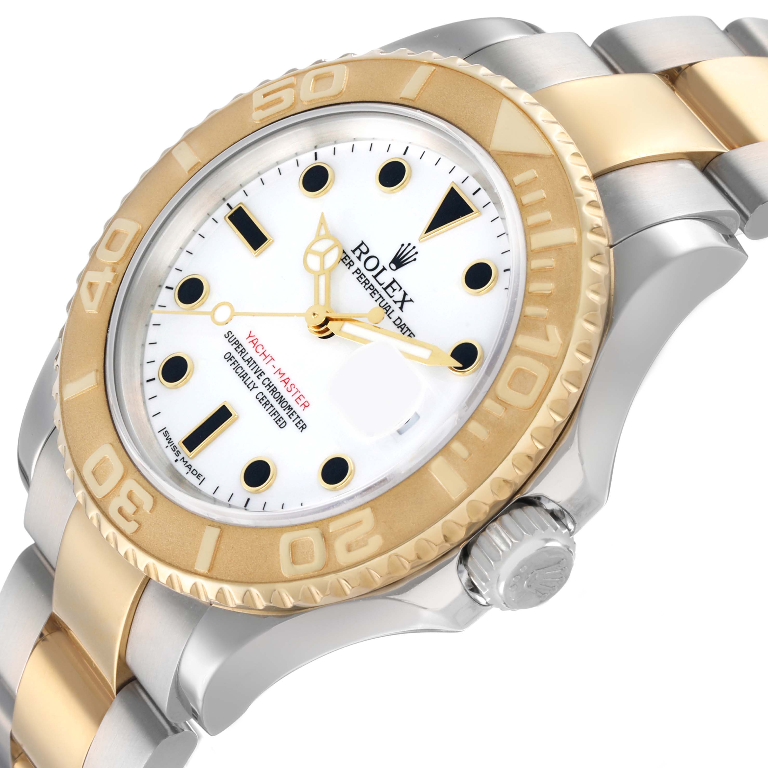 The image shows a Rolex Yacht-Master 16623 Men's Steel and Gold (two tone) White Dial watch at an angle highlighting the dial, bezel, crown, and part of the bracelet.