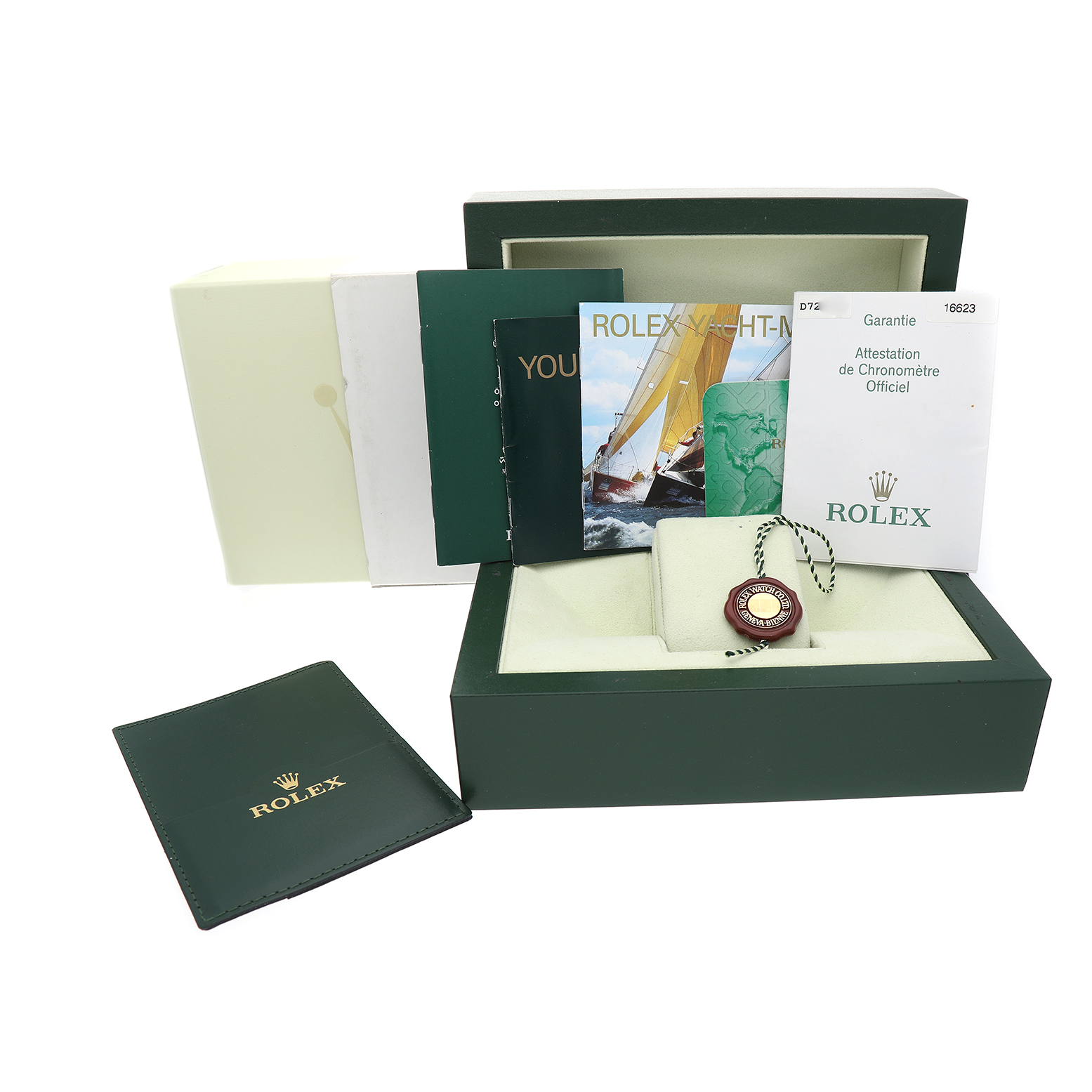 The image shows a Rolex Yacht-Master 16623 Men's Steel and Gold (two tone) White Dial watch box with manuals and a tag, viewed from the front at an angle.