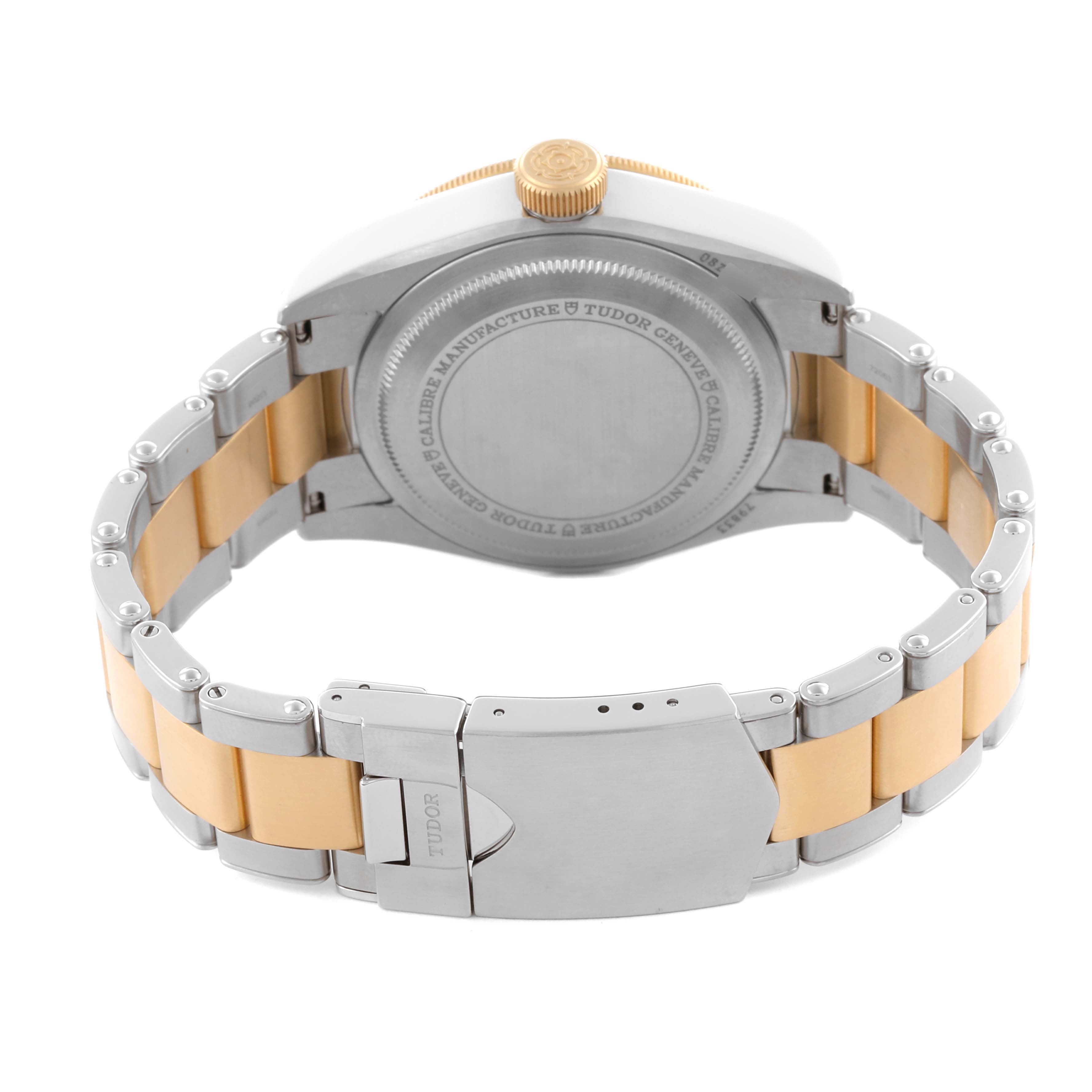 The image shows the back view of a Tudor Heritage Black Bay 79833MN Men's Steel and Gold (two tone) Black Dial 79833MN Men's Steel and Gold (two tone) Black Dial watch, highlighting the case back, bracelet, and clasp.