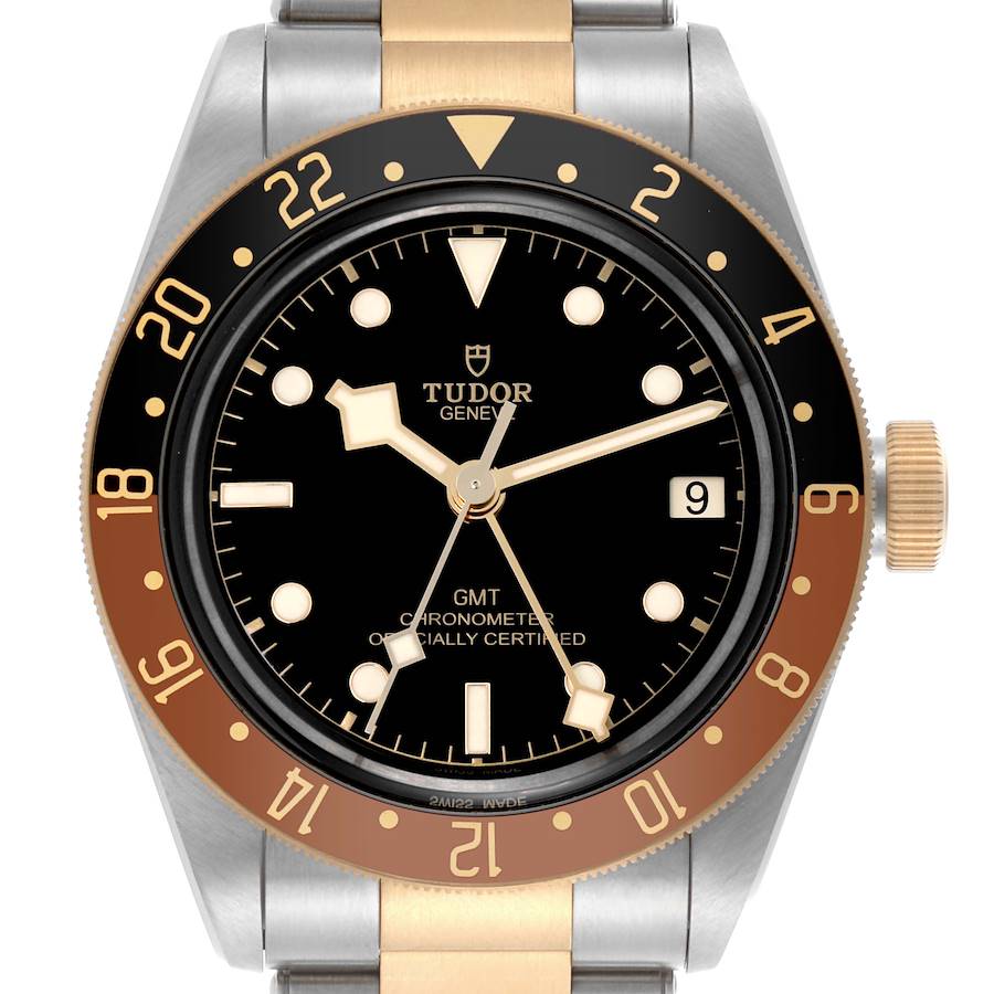 The Tudor Heritage Black Bay watch is shown from the front, displaying its bi-color bezel, dial, and partial bracelet.