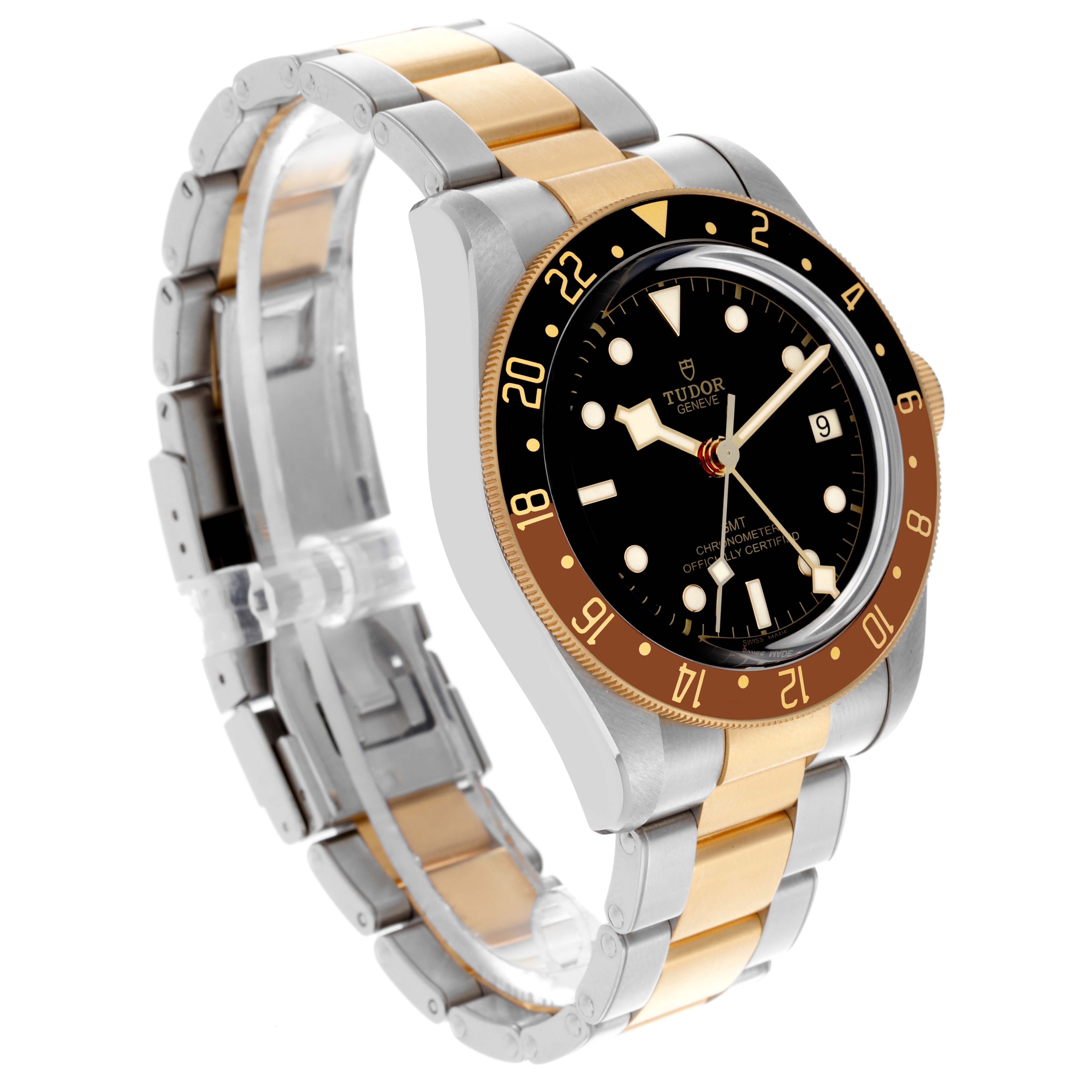 The Tudor Heritage Black Bay 79833MN Men's Steel and Gold (two tone) Black Dial 79833MN Men's Steel and Gold (two tone) Black Dial watch is shown at a three-quarter angle, highlighting its bezel, dial, case, and metal bracelet.