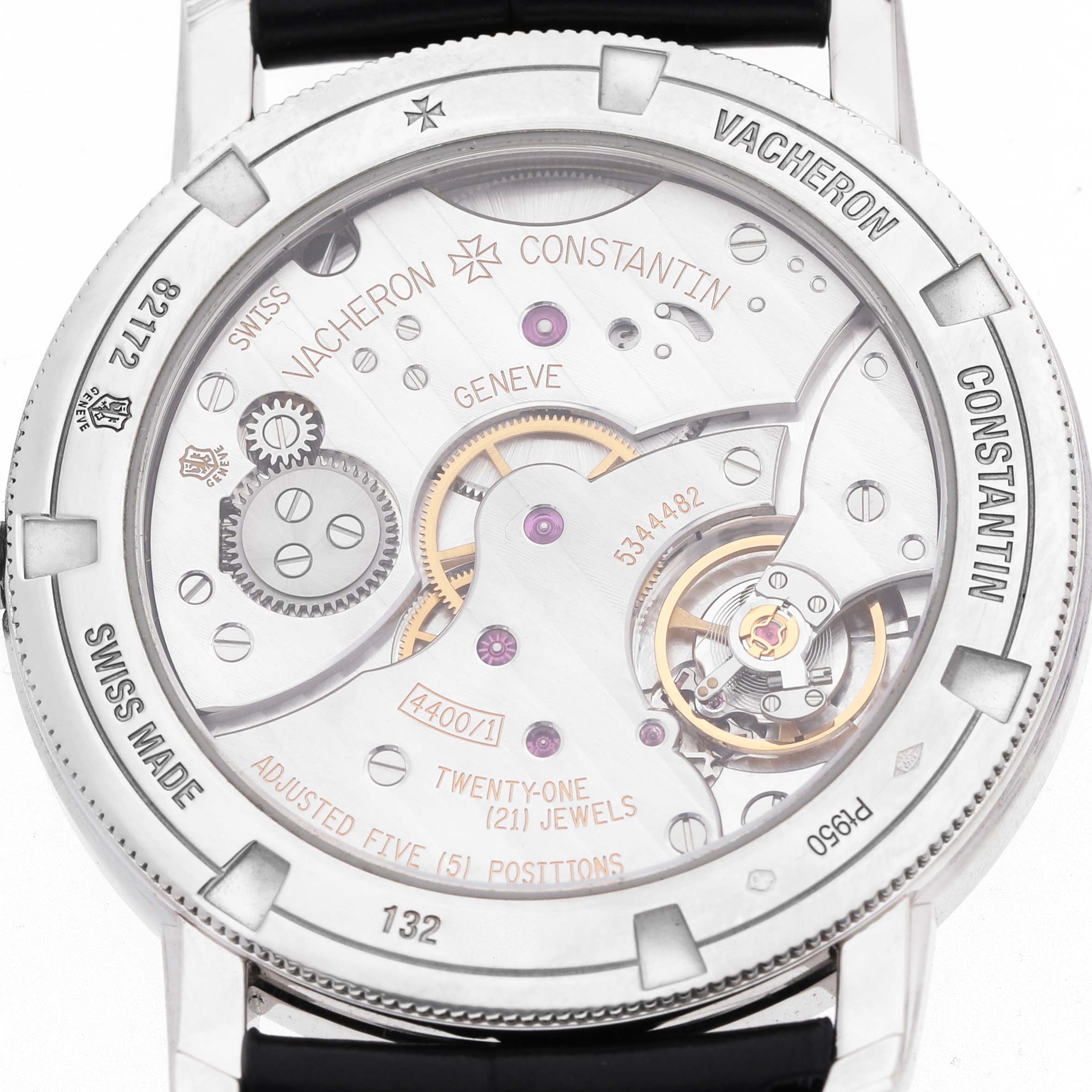 The image shows the backside of a Vacheron Constantin Traditionnelle 82172/000P-9811 Men's Platinum Grey Dial watch, highlighting its movement and inner mechanisms.