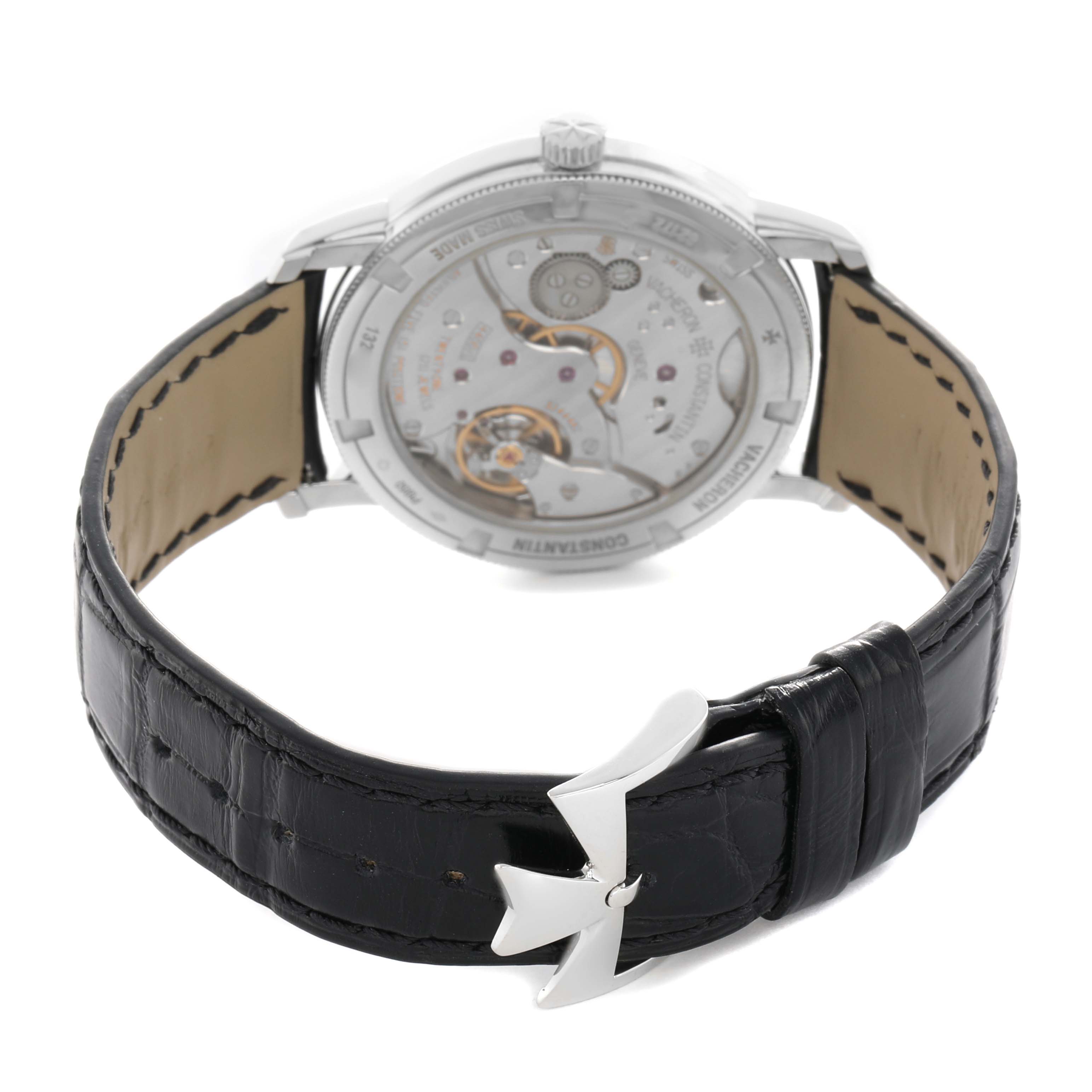 The Vacheron Constantin Traditionnelle 82172/000P-9811 Men's Platinum Grey Dial watch is shown from the back, highlighting the movement and leather strap.
