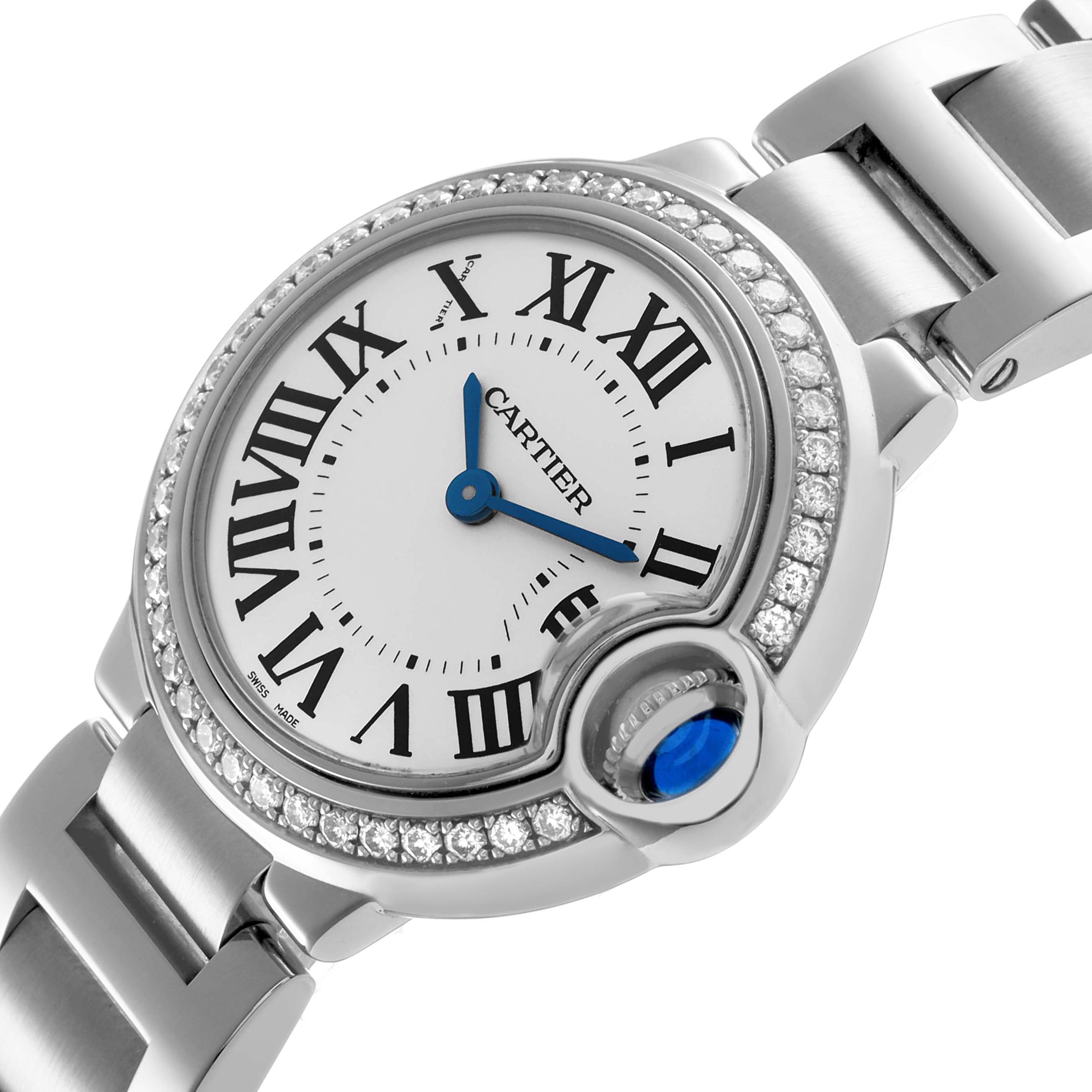 The Cartier Ballon Bleu W4BB0015 Women's Stainless Steel Silver Dial watch is shown at an angle highlighting its face, diamond bezel, and part of the bracelet.