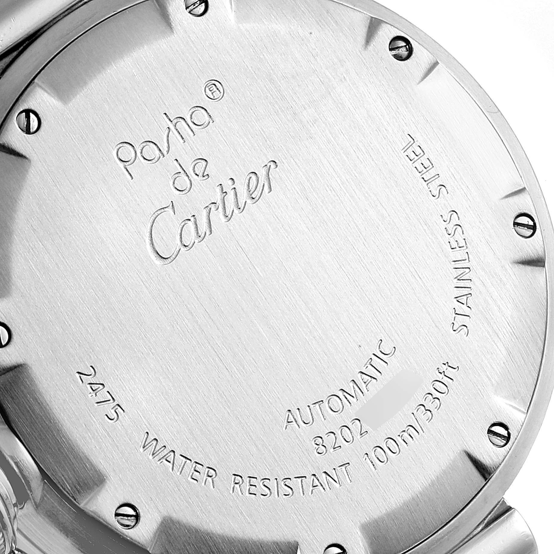 The image shows the backside of a Cartier Pasha W31055M7 Men's Stainless Steel White Dial W31055M7 Men's Stainless Steel White Dial model watch with engraved details on its case back.