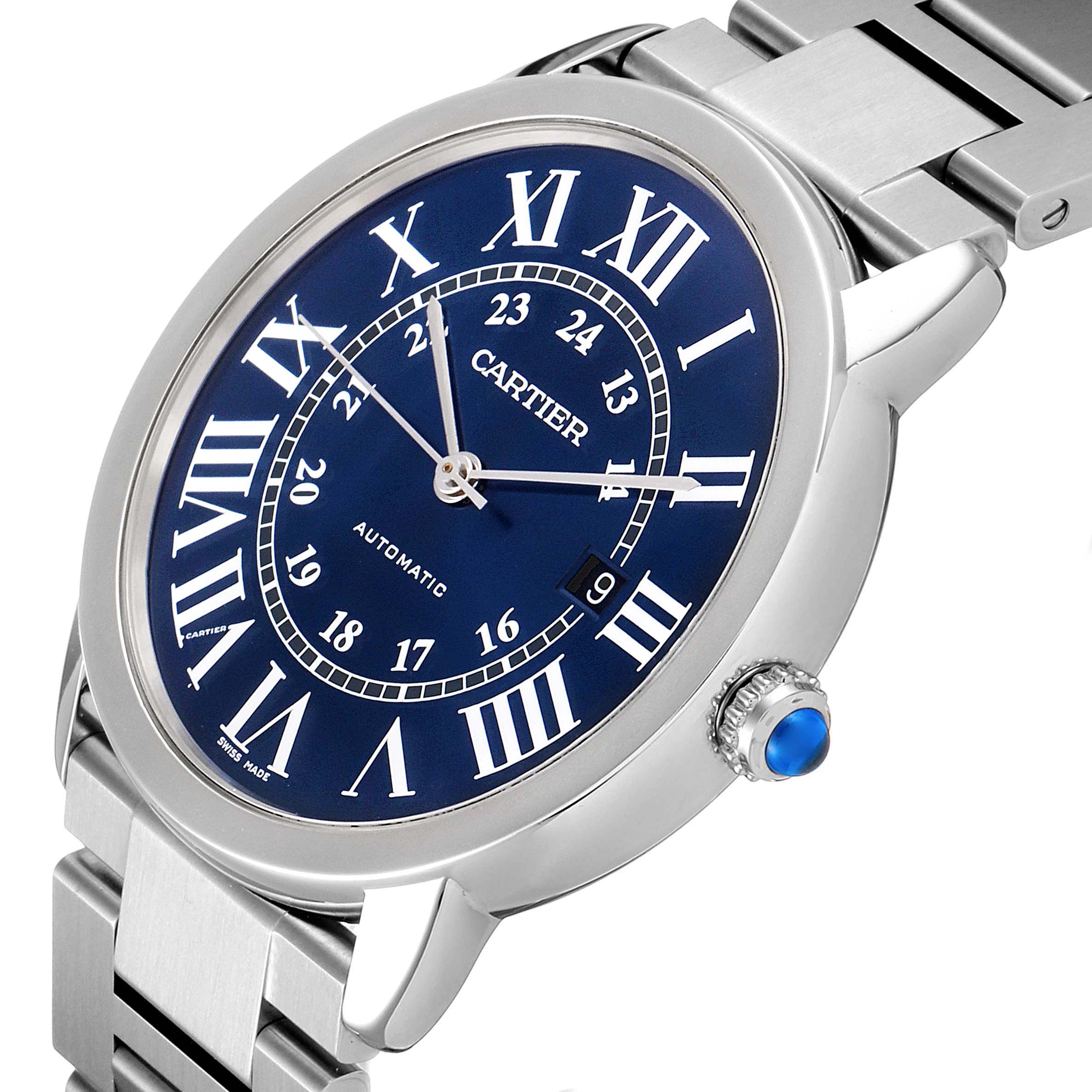 The Cartier Ronde WSRN0023 Men's Stainless Steel Blue Dial WSRN0023 Men's Stainless Steel Blue Dial watch is shown from a front angle, highlighting its blue dial, Roman numerals, metal bracelet, and blue cabochon crown.