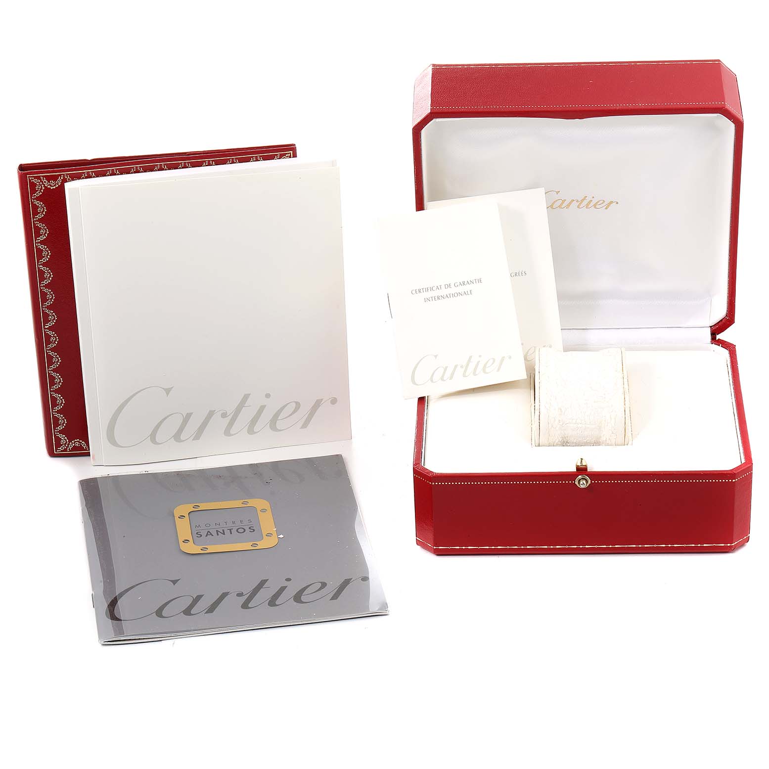 The image shows a Cartier Santos W20060D6 Men
s Stainless Steel Silver Dial W20060D6 Men
s Stainless Steel Silver Dial watch box, manuals, and warranty card from a front angle.