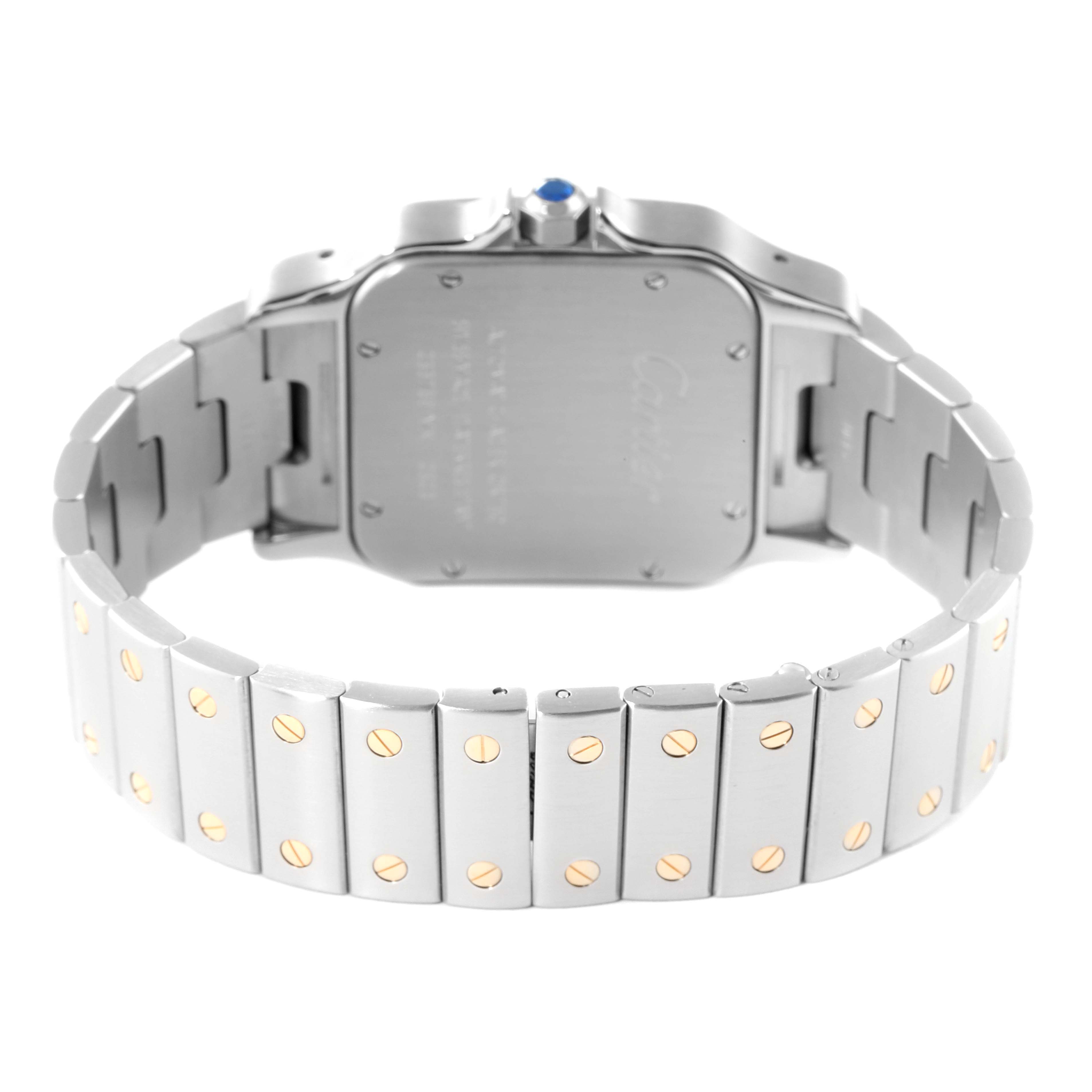 The image shows the back case and bracelet of the Santos model by Cartier at a rear, angled view.